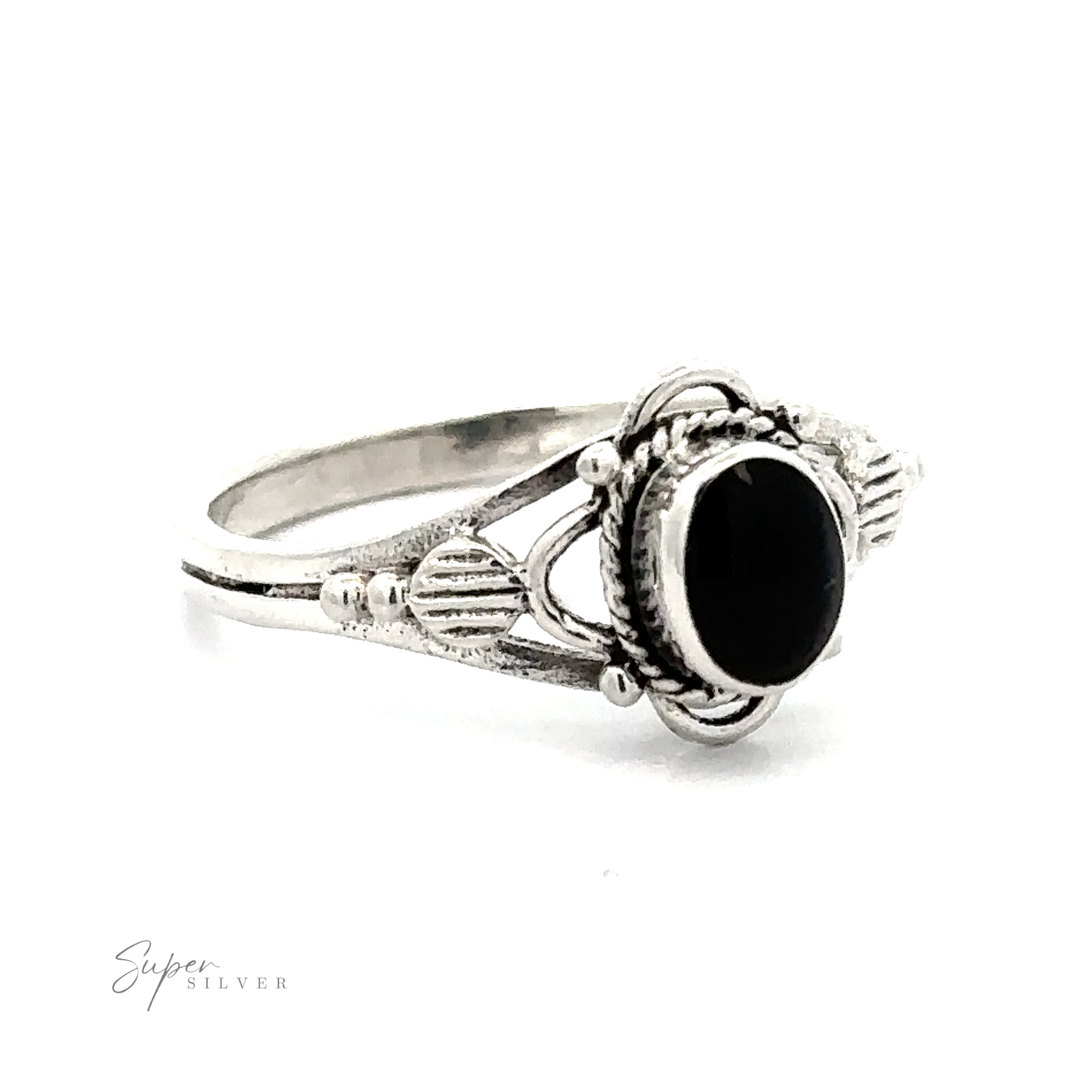 A vintage silver ring with a Fancy Oval Inlay Stone.