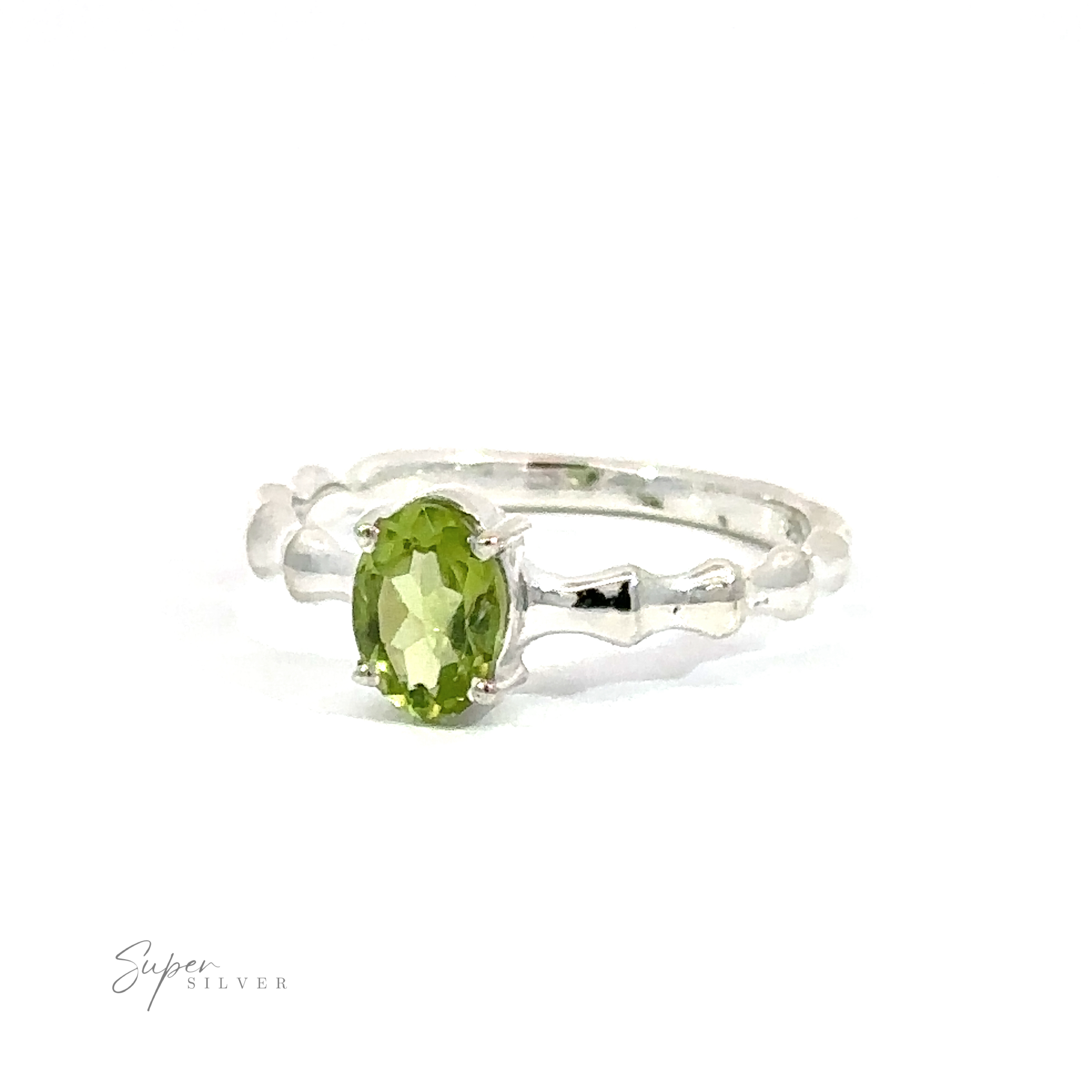 Pronged Oval Gemstone Ring with Textured Band set in a .925 sterling silver ring.