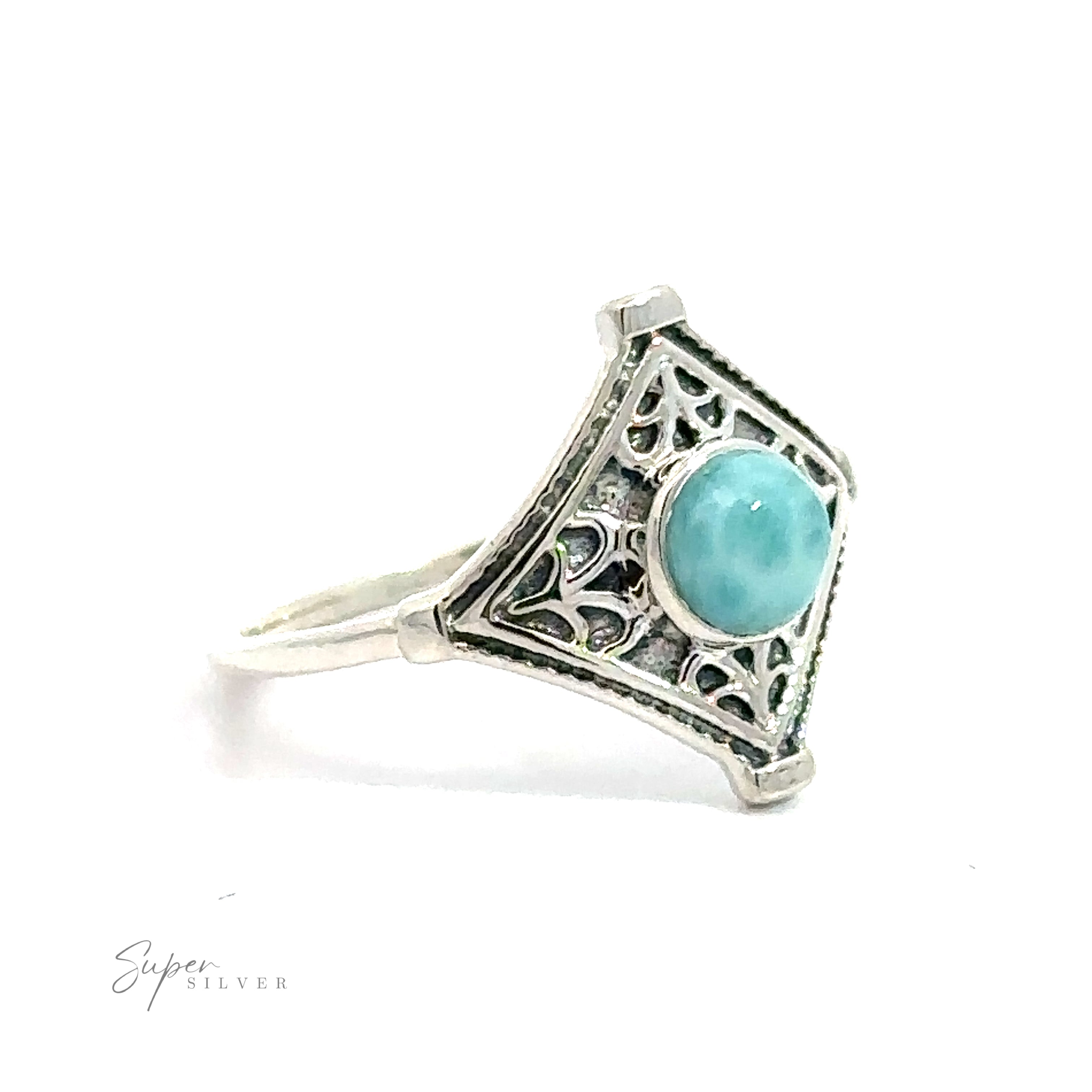 Intricate Diamond Silver Ring featuring an intricate filigree design with a central turquoise stone, displayed against a white background.