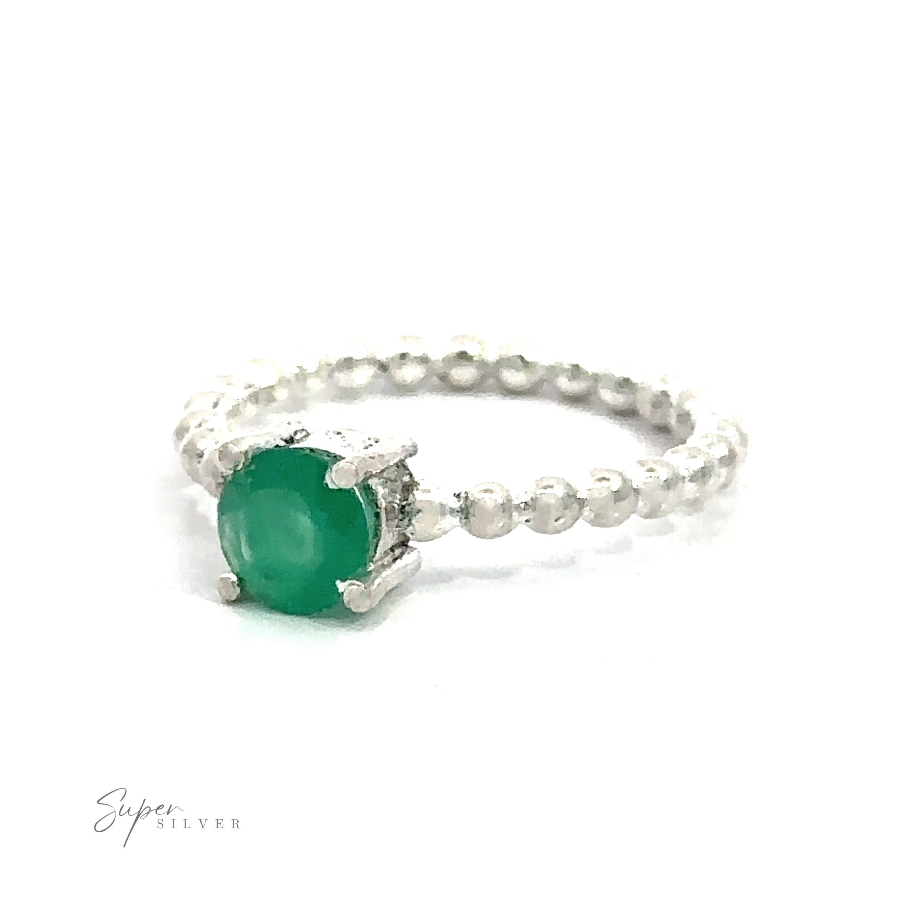 Stunning Circular Gemstone Ring with Beaded Band with a vibrant green gemstone on a white background.