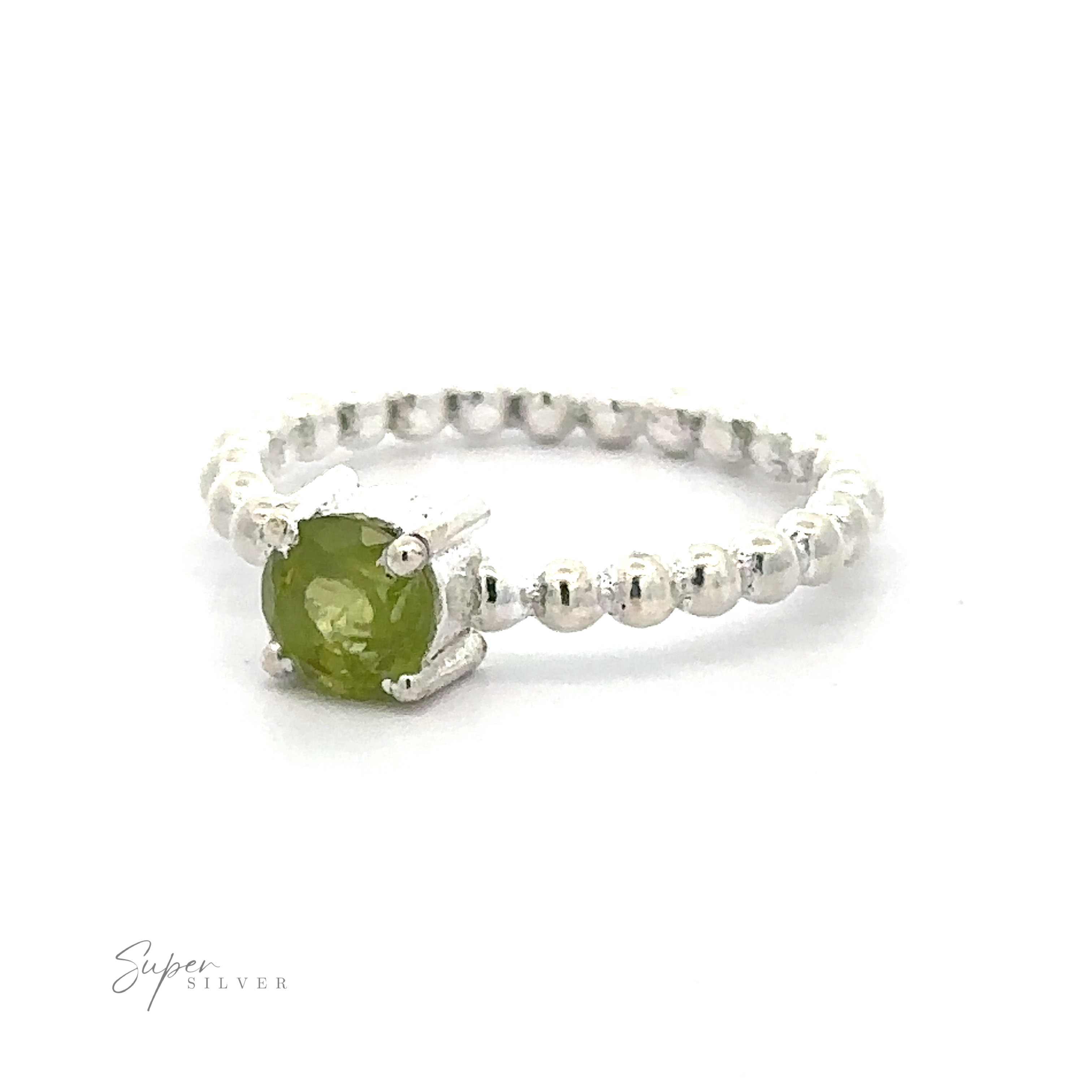 Stunning Circular Gemstone Ring with Beaded Band with a green gemstone on a white background.