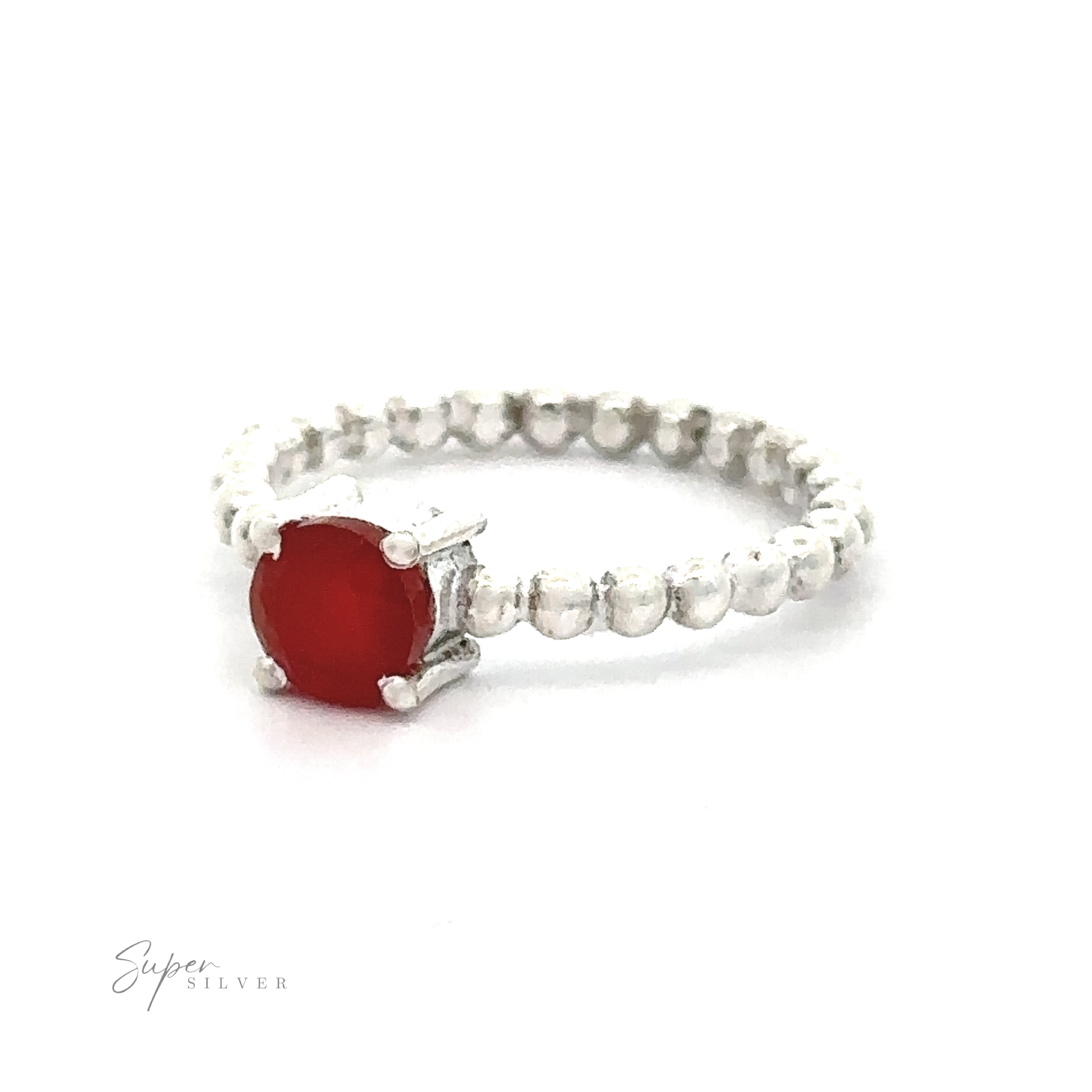 Stunning Circular Gemstone Ring with Beaded Band with a vibrant red gemstone on a white background.