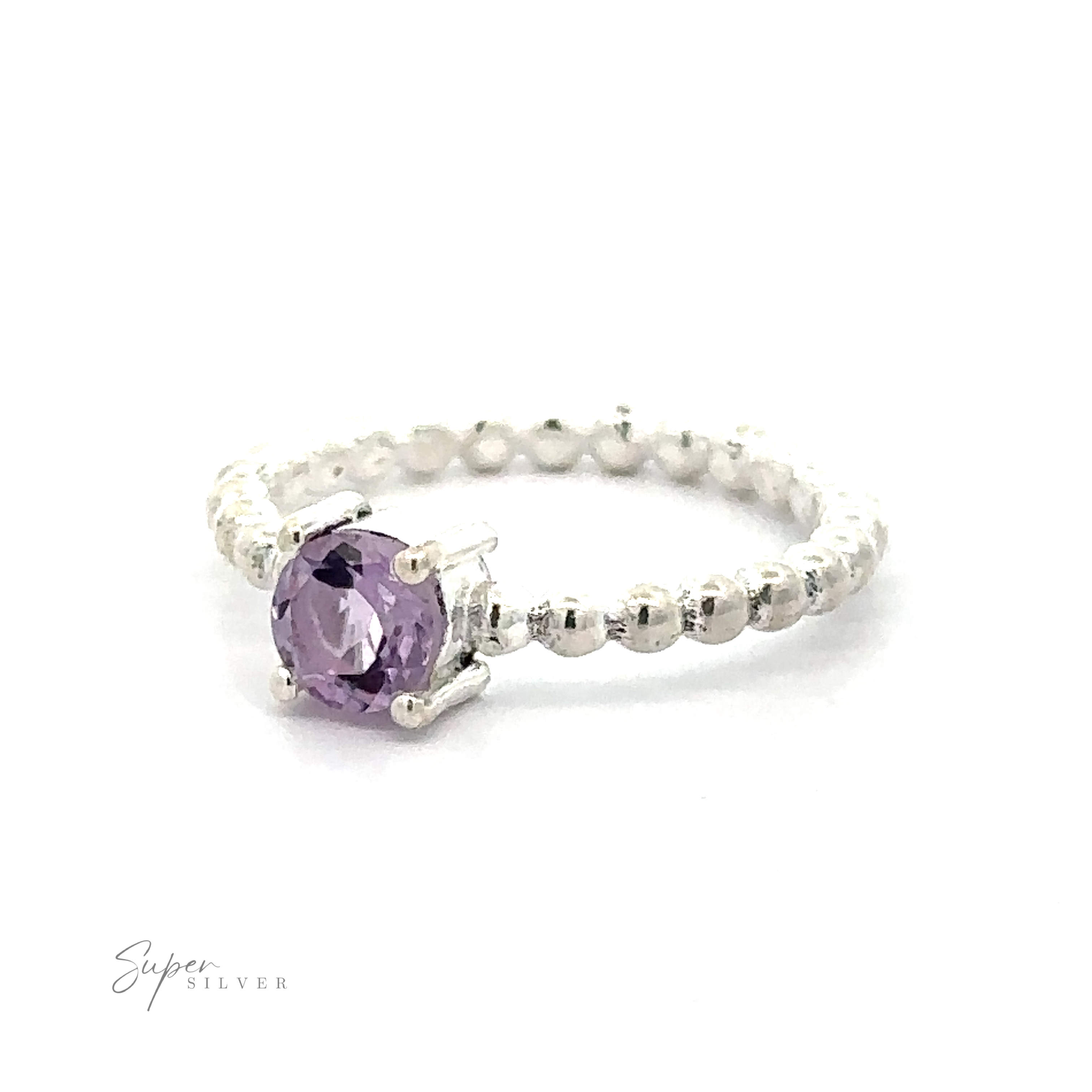 Stunning Circular Gemstone Ring with Beaded Band with a vibrant purple gemstone on a white background.