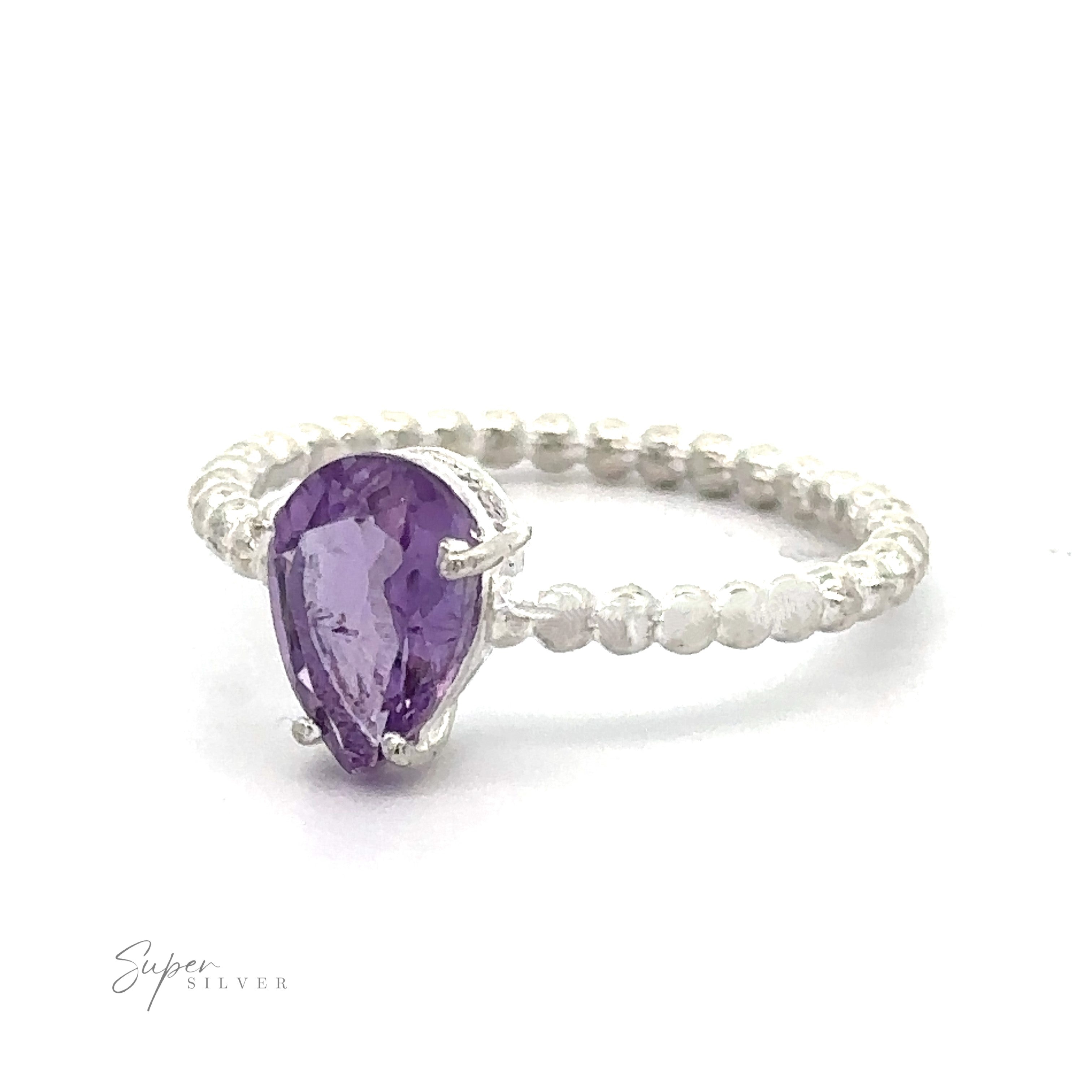Vibrant Teardrop Gemstone Ring with Beaded Band with a white background.