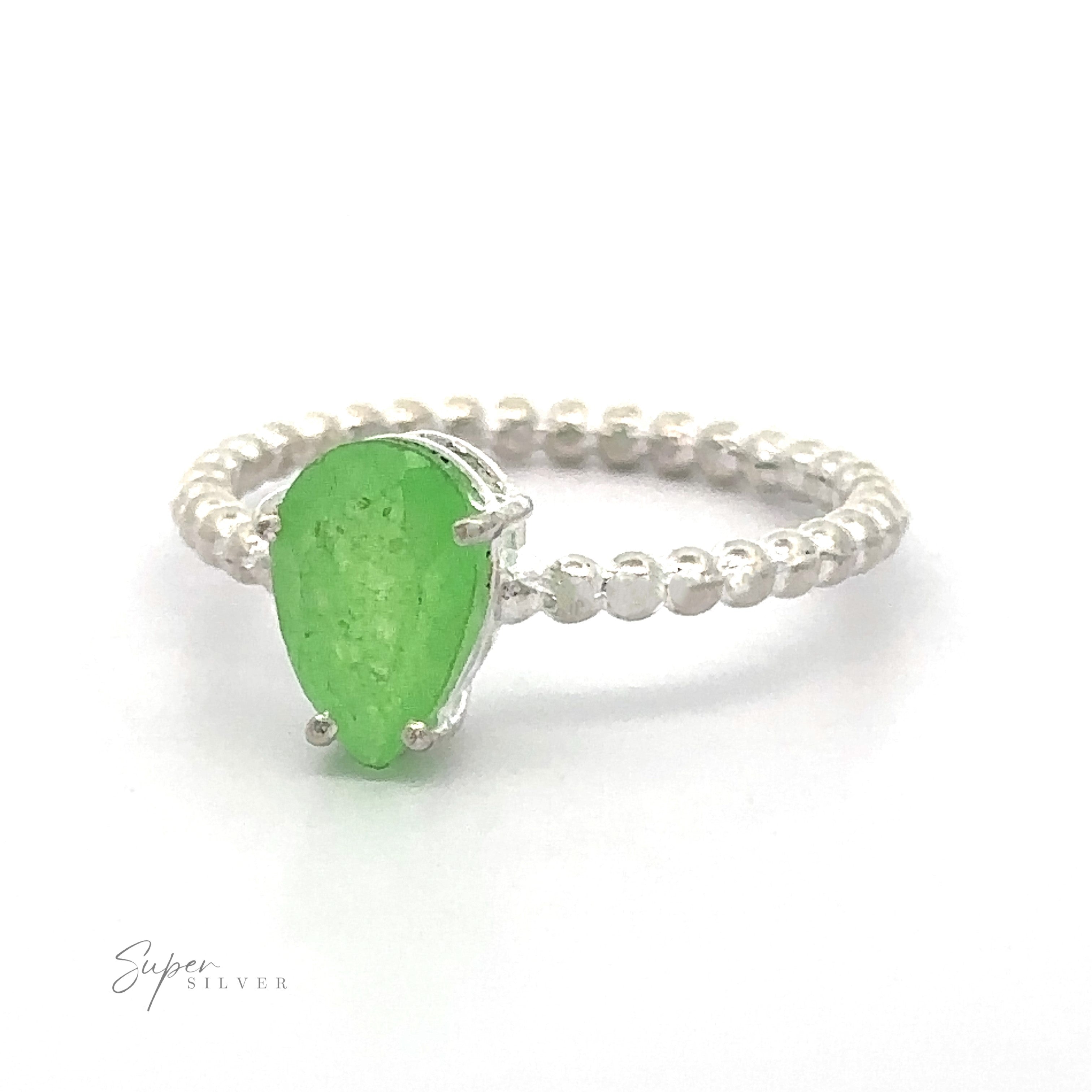 Vibrant Teardrop Gemstone Ring with Beaded Band with a teardrop green gemstone on a white background.