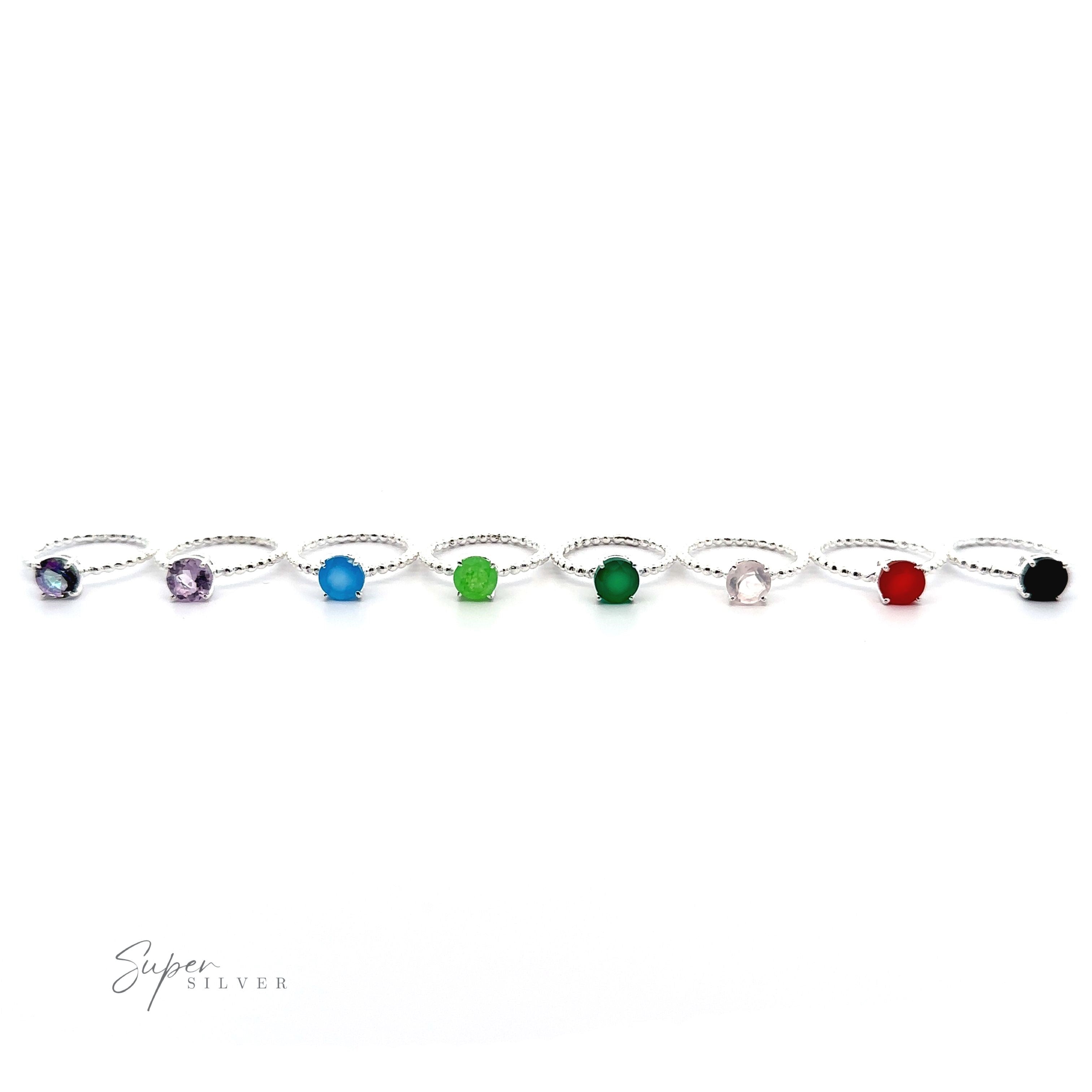 A Stunning Circular Gemstone Ring with Beaded Band Small Sizes on a white background.