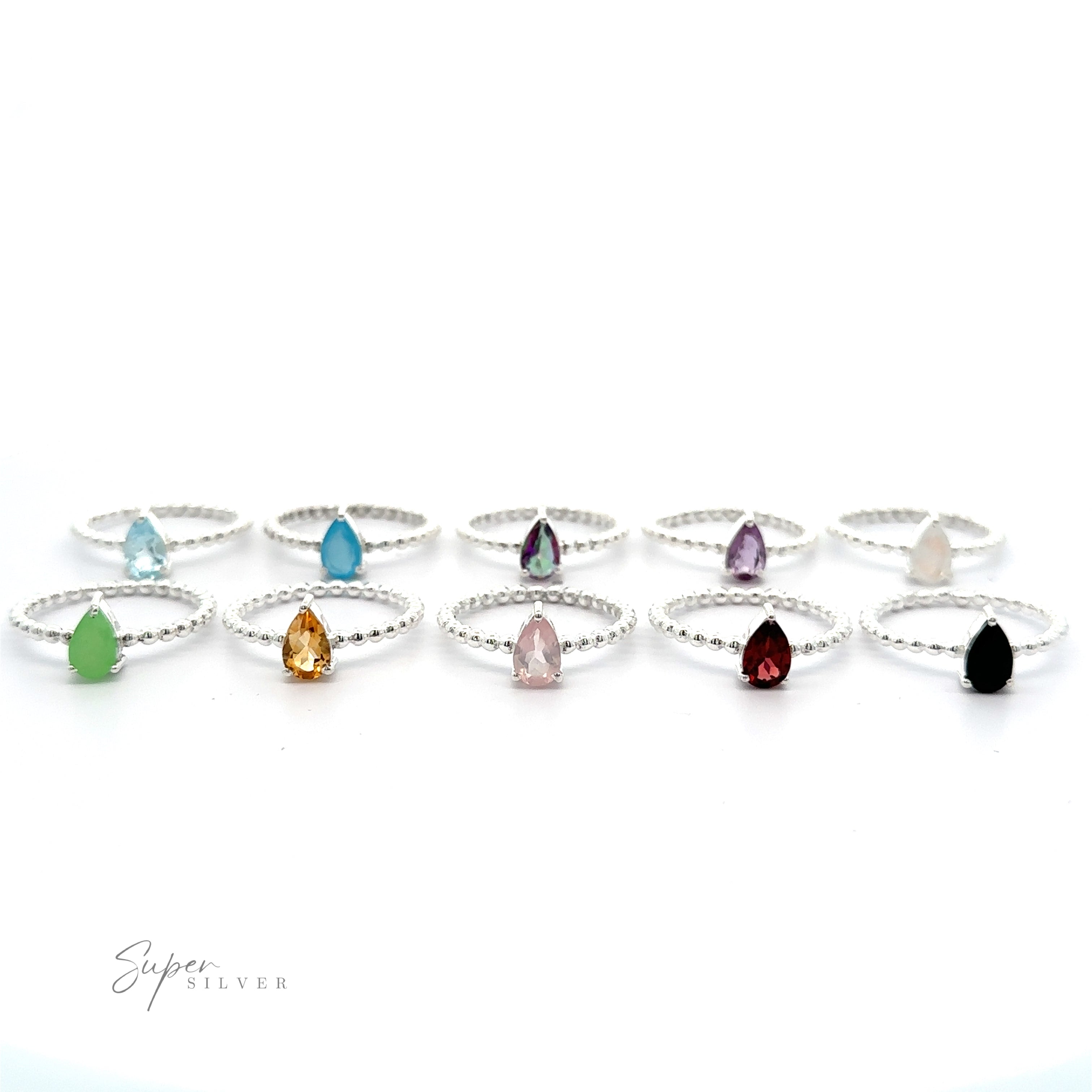A collection of Sparkling Teardrop Gemstone on Beaded Band rings with various colored teardrop gemstones, displayed against a white background.