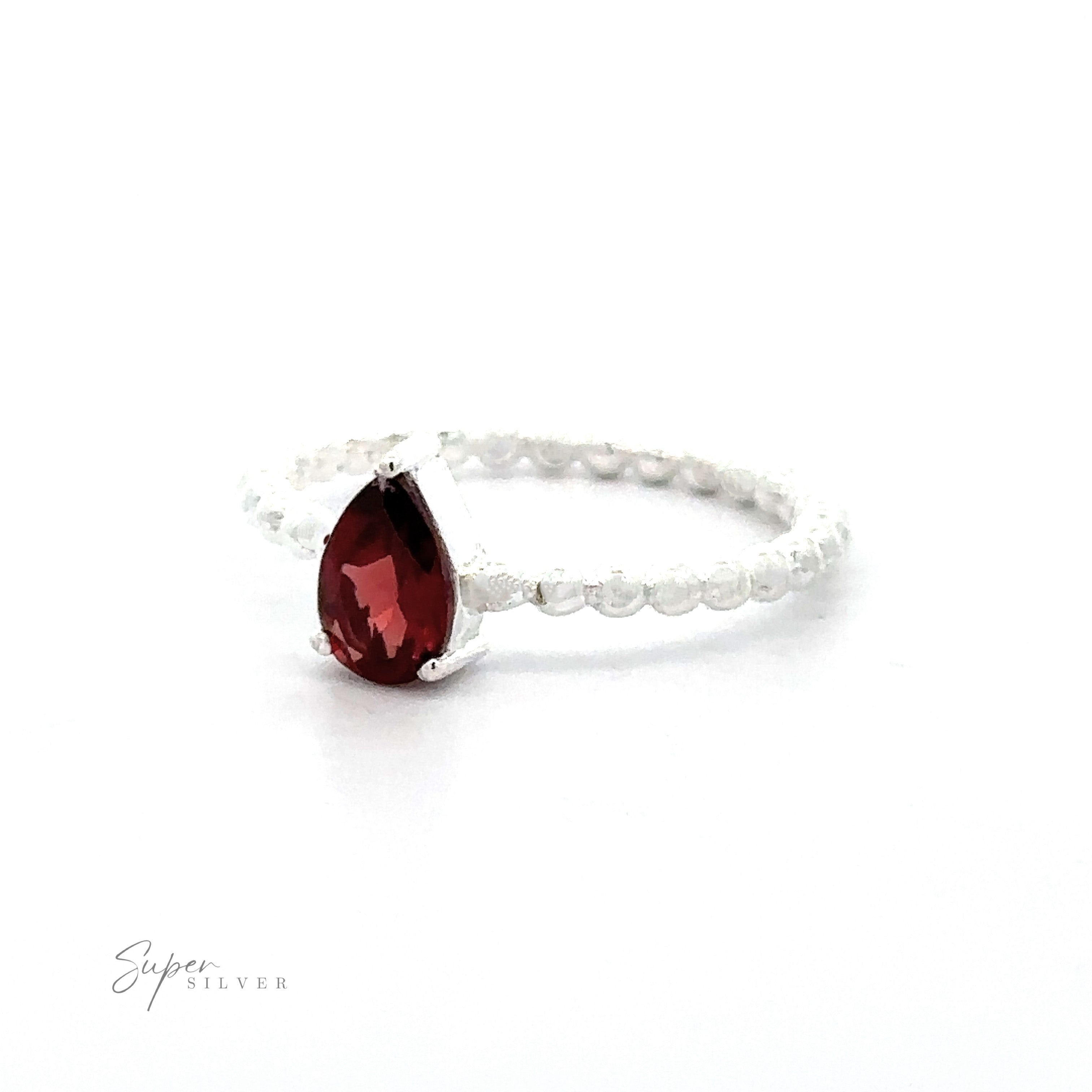 .925 Sterling Silver ring with a Sparkling Teardrop Gemstone on Beaded Band in a prong setting on a white background.