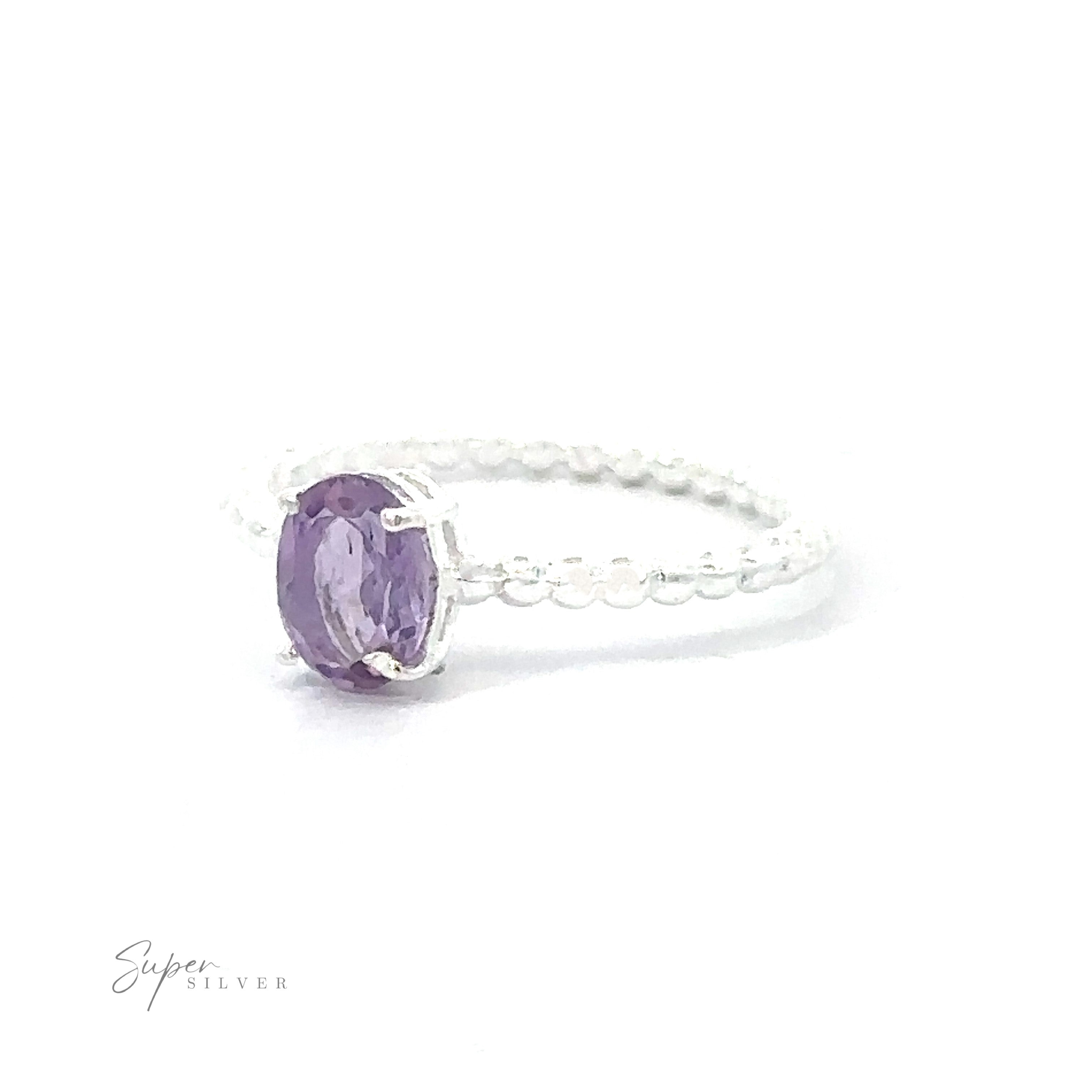 Stunning Oval Gemstone Ring with Beaded Band with a single oval amethyst on a white background.