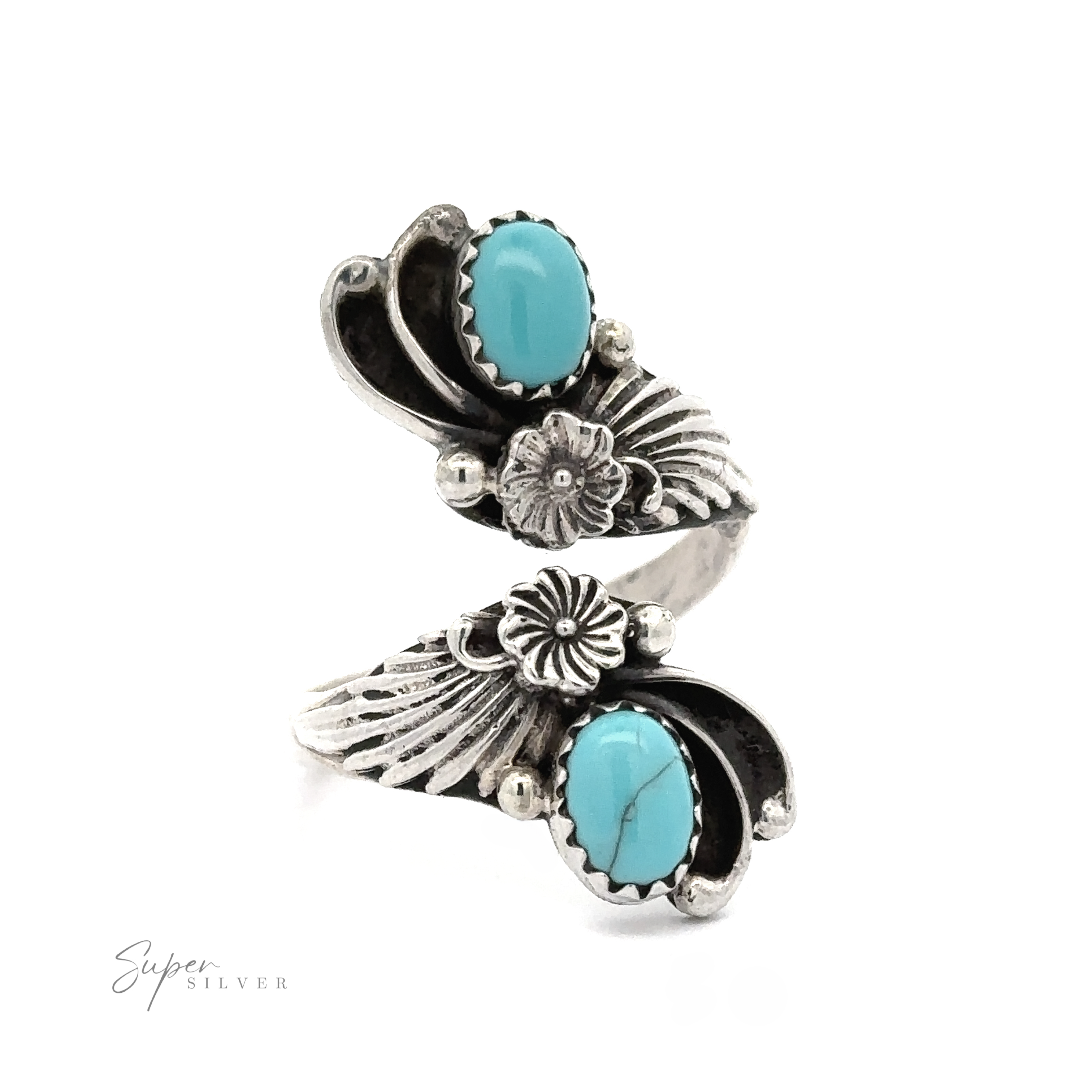 Sterling silver cuff bracelet featuring two turquoise stones and detailed floral engravings, adjustable to fit various sizes, displayed on a white background.