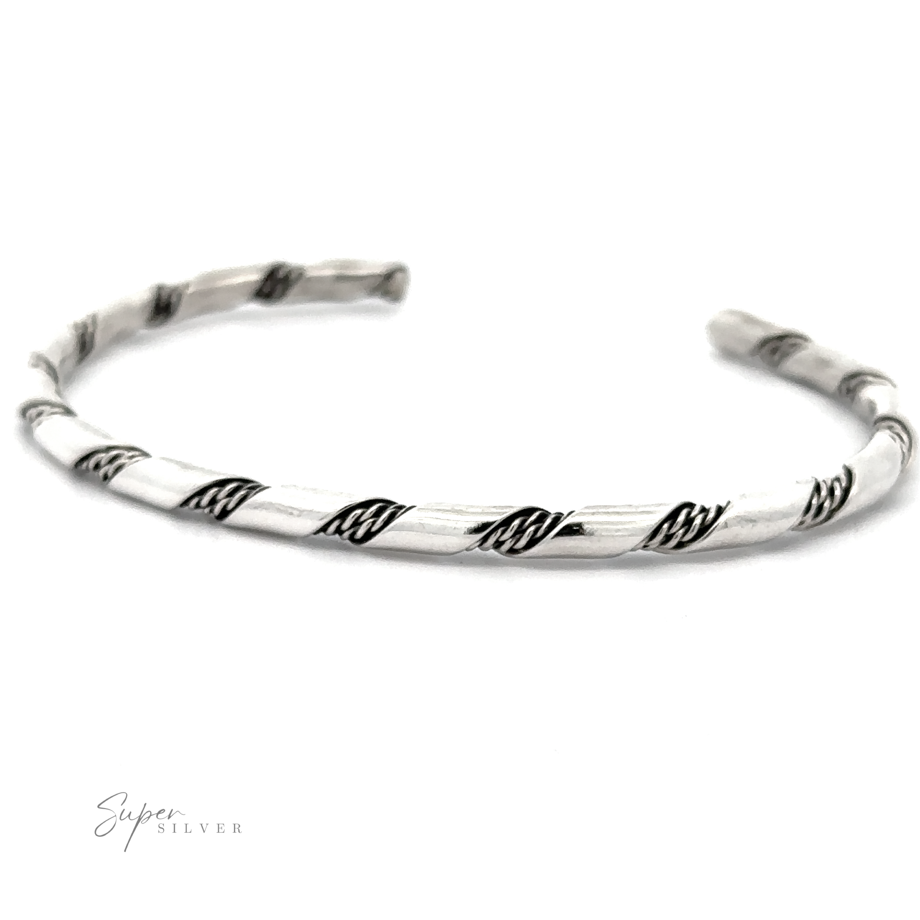 A delicate Native American Handmade Thin Silver Twist Cuff with an open cuff design displayed against a white background. The bracelet has black accents along the twists, perfect for stacking with other pieces.
