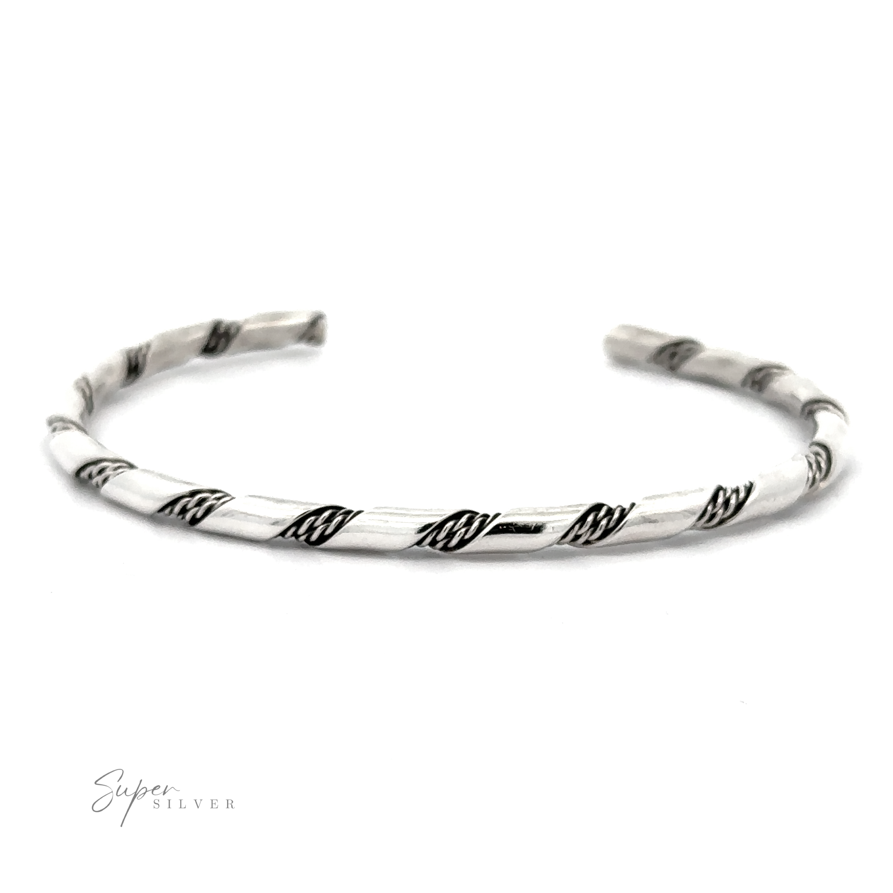 A delicate Native American Handmade Thin Silver Twist Cuff with twisted black accents, showcasing an open design with tapered ends, placed against a white background. The "Super Silver" logo is visible in the bottom-left corner, perfect for stacking.