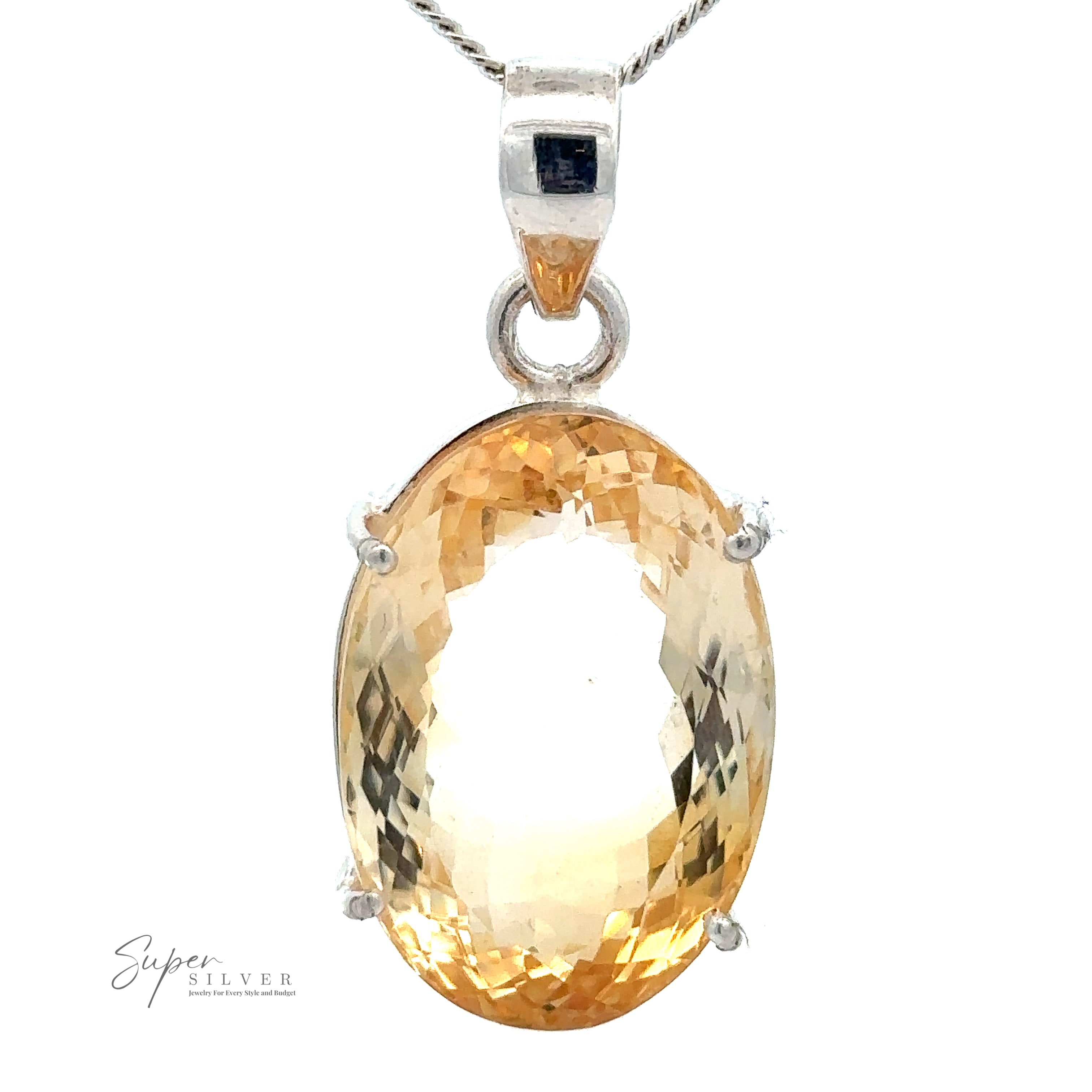 A Brilliant Pronged Citrine Pendant with an oval-shaped, light amber gemstone set in sterling silver, attached to a silver chain. The faceted cut gemstone adds extra sparkle, and the pendant has a small engraved "Super Silver" logo on the bottom left.