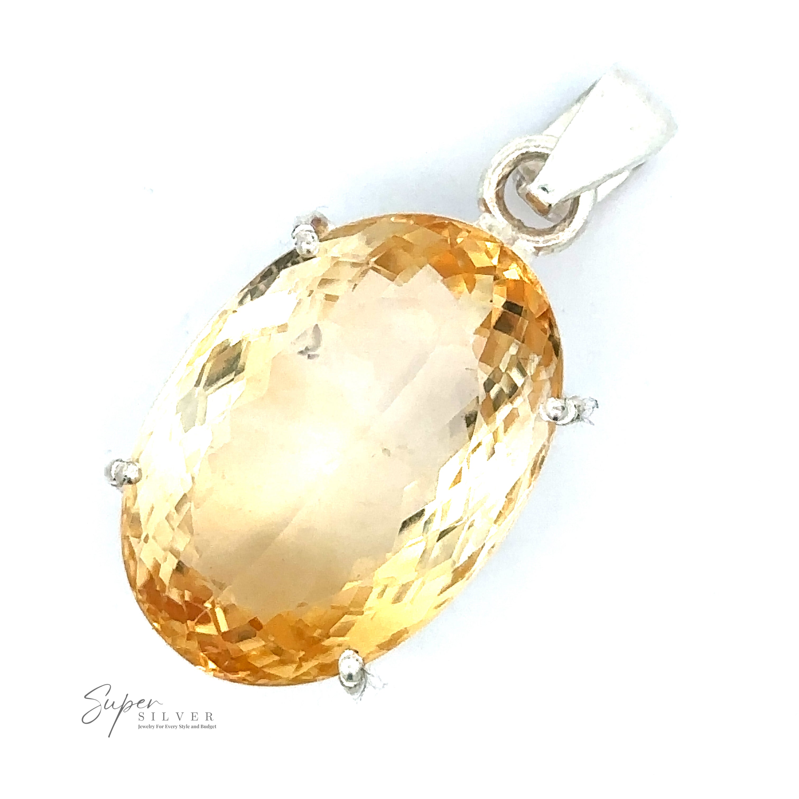 A silver pendant with an oval-cut, faceted yellow gemstone set in a four-pronged setting. The image includes a "Super Silver" branding in the bottom left corner, showcasing the elegance of .925 Sterling Silver and the captivating sparkle of the Brilliant Pronged Citrine Pendant.