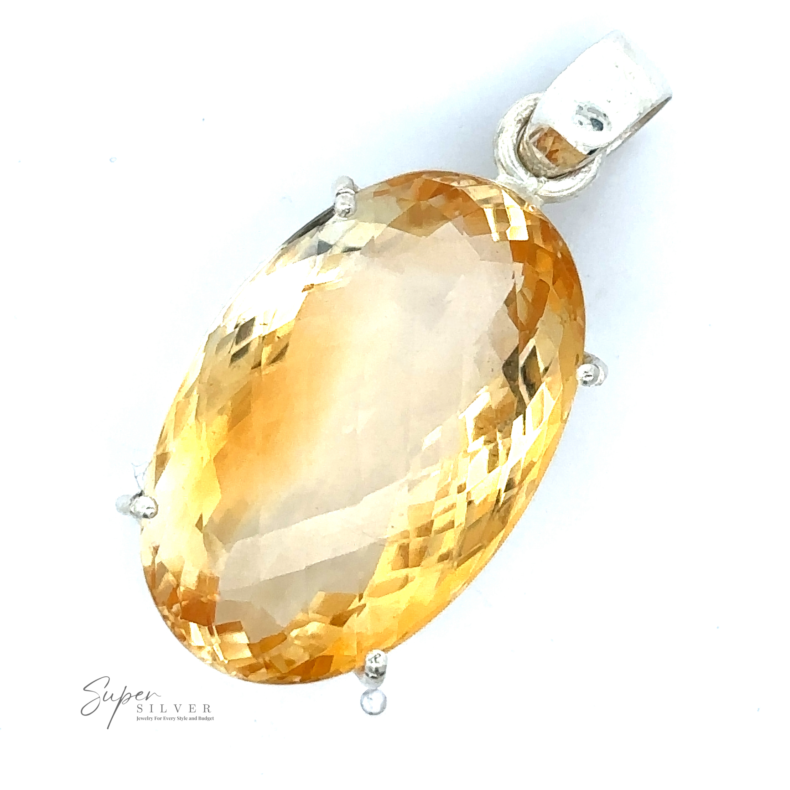 A Brilliant Pronged Citrine Pendant featuring an oval-shaped, faceted yellow gemstone set in .925 Sterling Silver with a bail. Text "Super Silver" is visible in the bottom left corner.