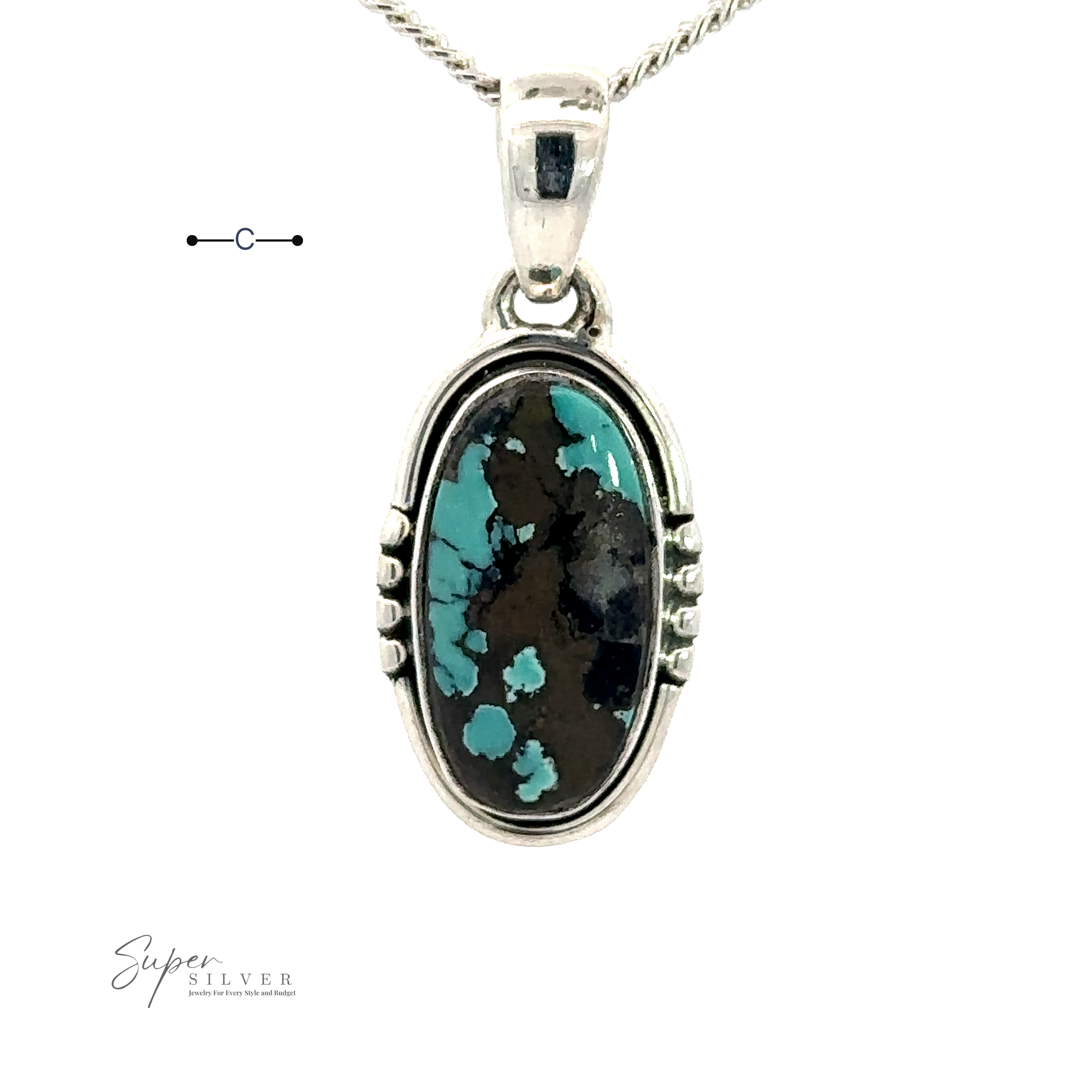 A Natural Turquoise Elongated Oval Pendant with a black stone set in a detailed bezel.