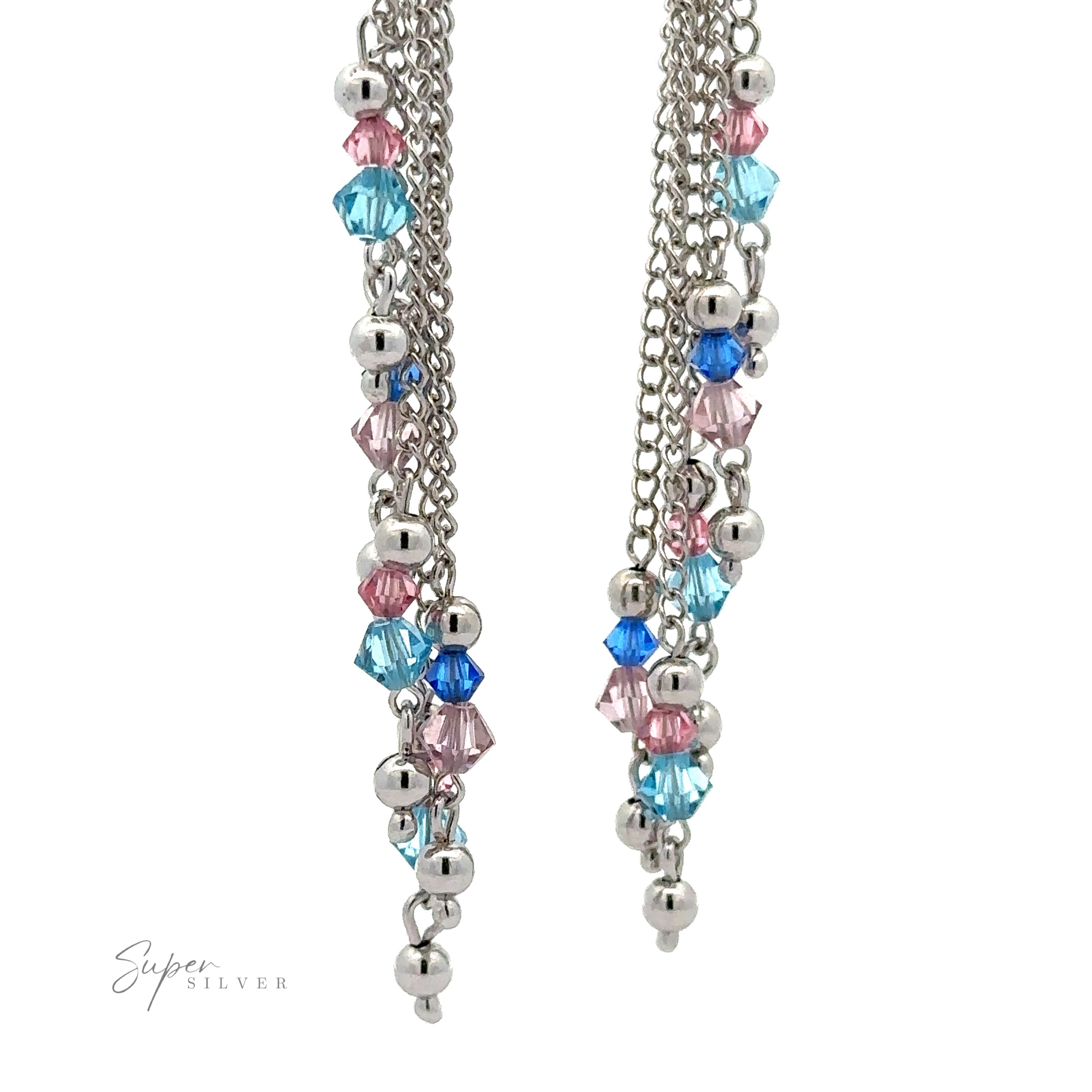Close-up of a pair of Layered Earrings with Multicolored Beads crafted from rhodium-plated sterling silver, featuring multicolored beads in pink, blue, and clear accents.
