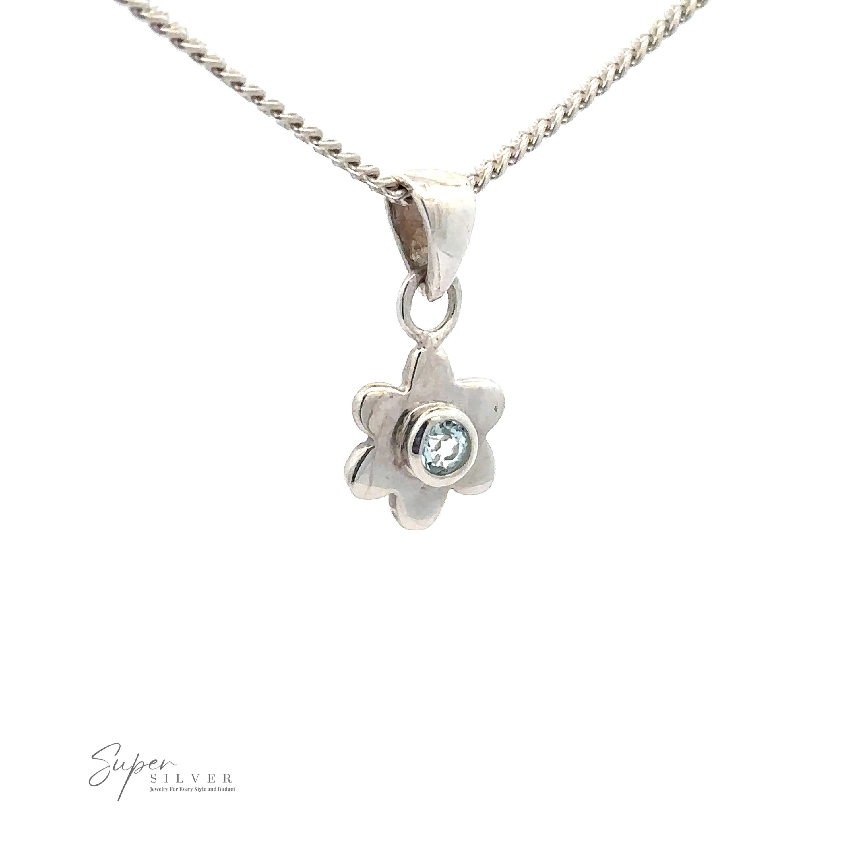 A silver necklace with a Tiny Gemstone Flower Pendant featuring a small gemstone in the center. This exquisite piece of sterling silver jewelry is from Super Silver.