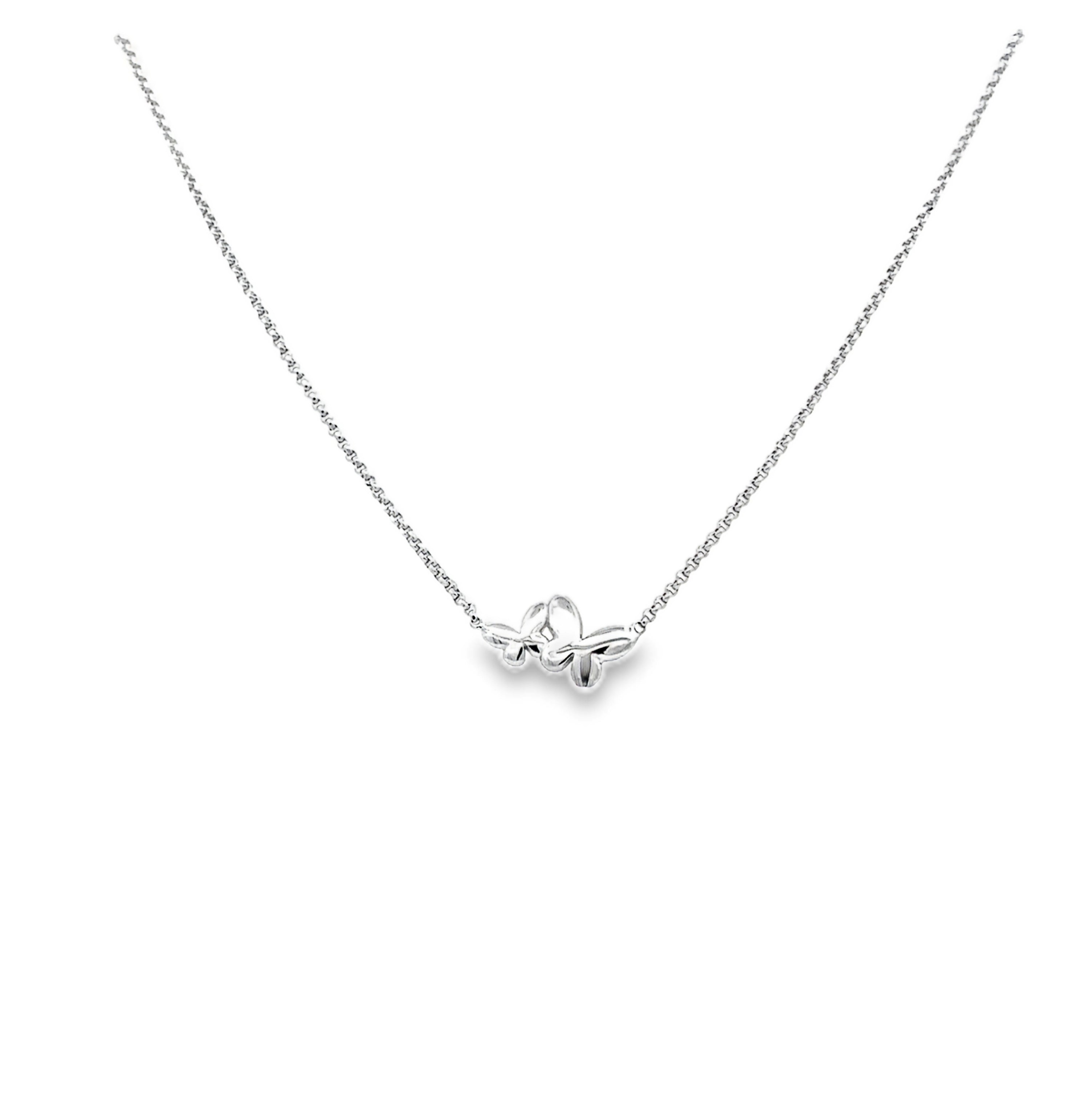 The Dainty Double Butterfly Necklace is an elegant Italian silver piece with a delicate butterfly pendant, beautifully showcased on a white background—a stunning sterling silver accessory for any occasion.