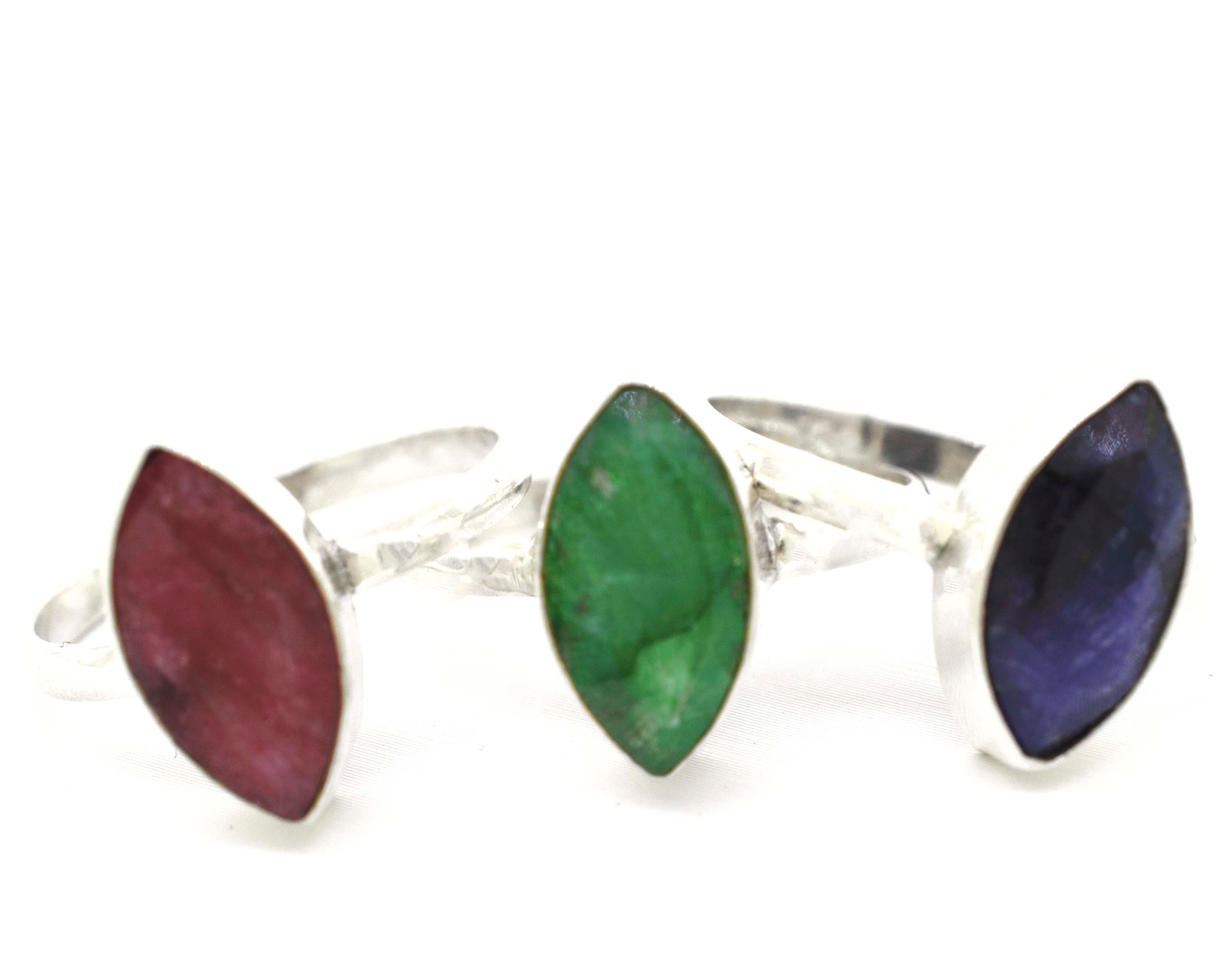 A boho set of three Simple Marquise Shaped Gemstone Rings with different colored stones.