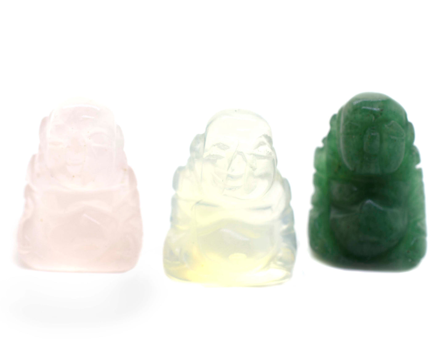 Three Laughing Buddha Gemstone Figures made of jade on a white background.