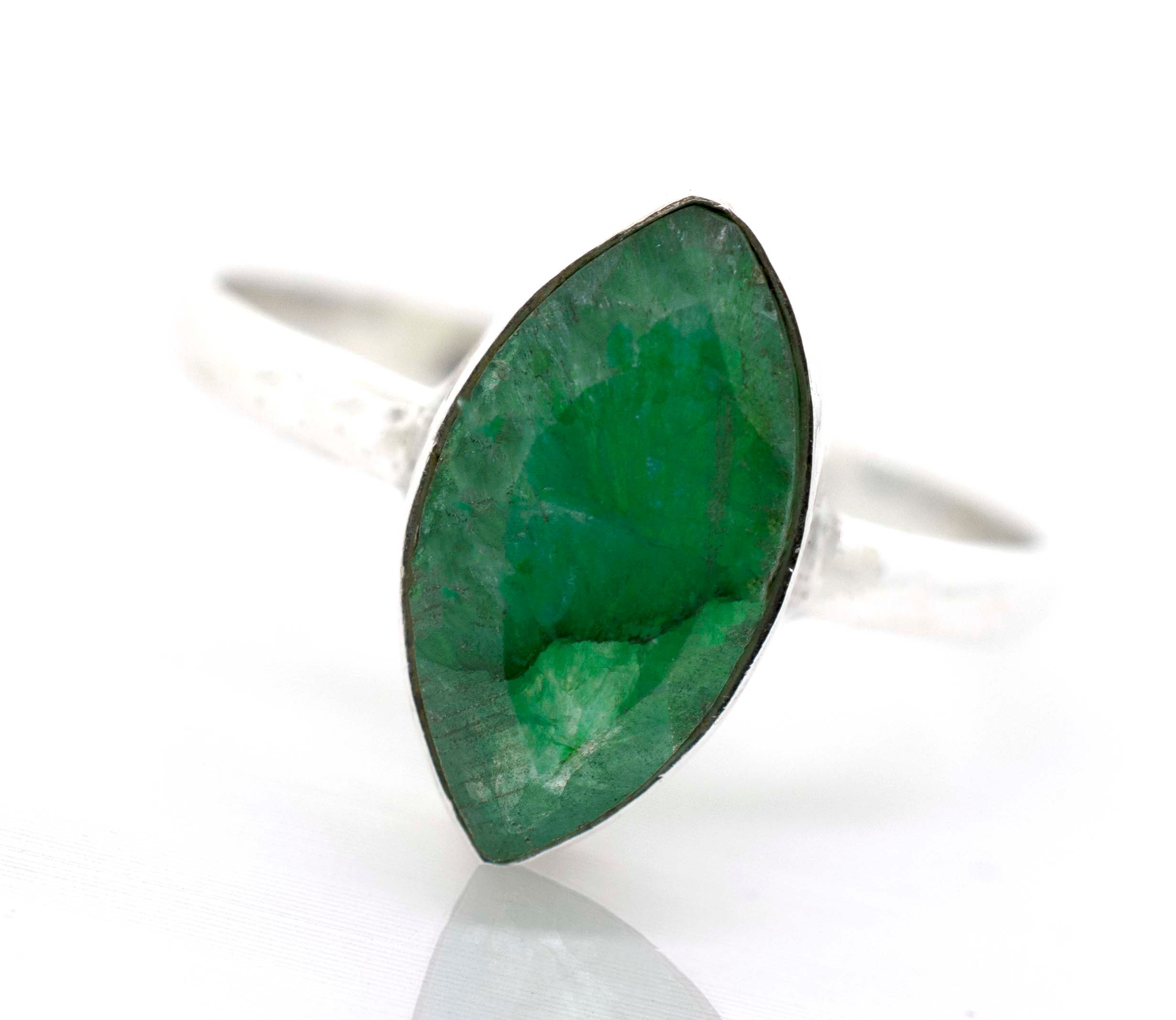 A sterling silver ring with a Simple Marquise Shaped Gemstone.