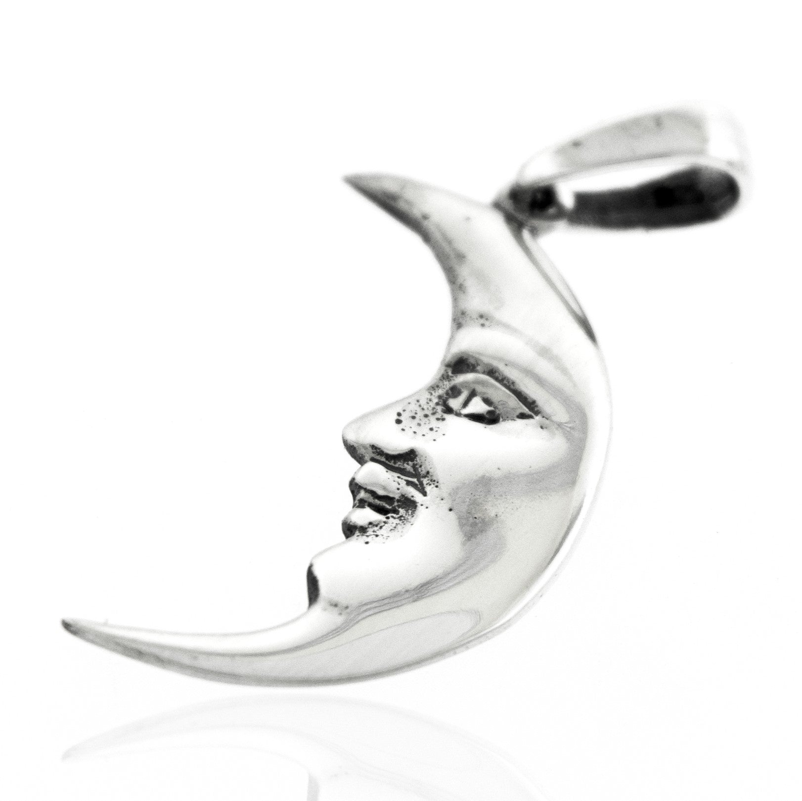 Sterling silver Crescent Man In The Moon Pendant featuring a face with delicate detailing on the front, this elegant lunar charm is perfect for any occasion.