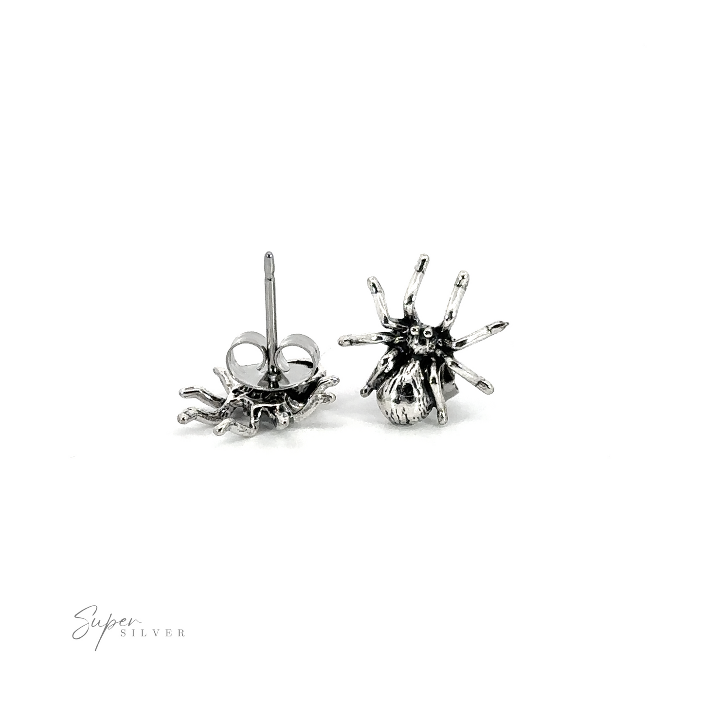 A pair of gothic Spider Studs on a white background, creating a stylish accessory.