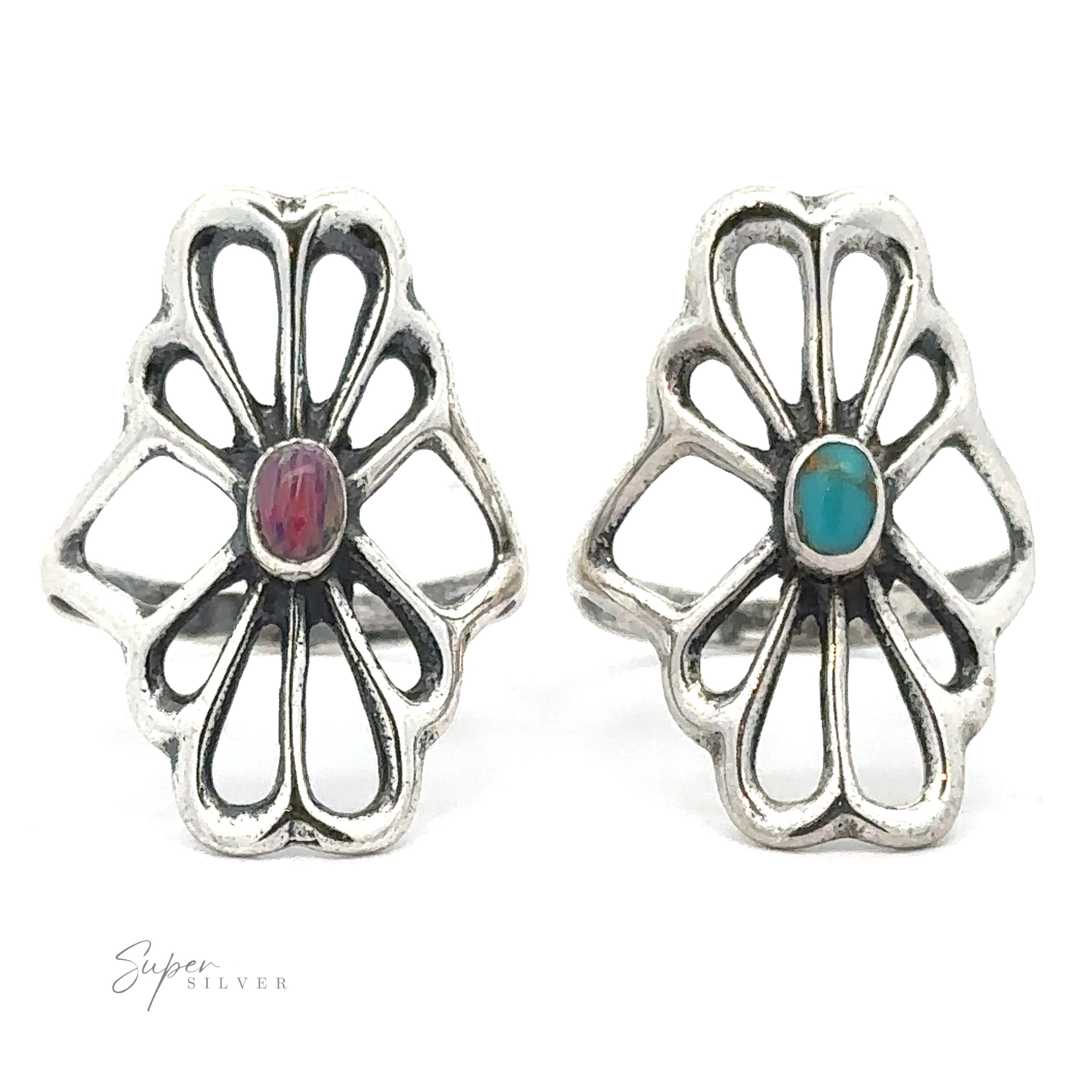 Two American Made Flower Rings each feature ornate floral patterns with a central oval gemstone, one purple and the other turquoise. Handcrafted in America, they proudly display the "Super Silver" logo in the lower left corner.