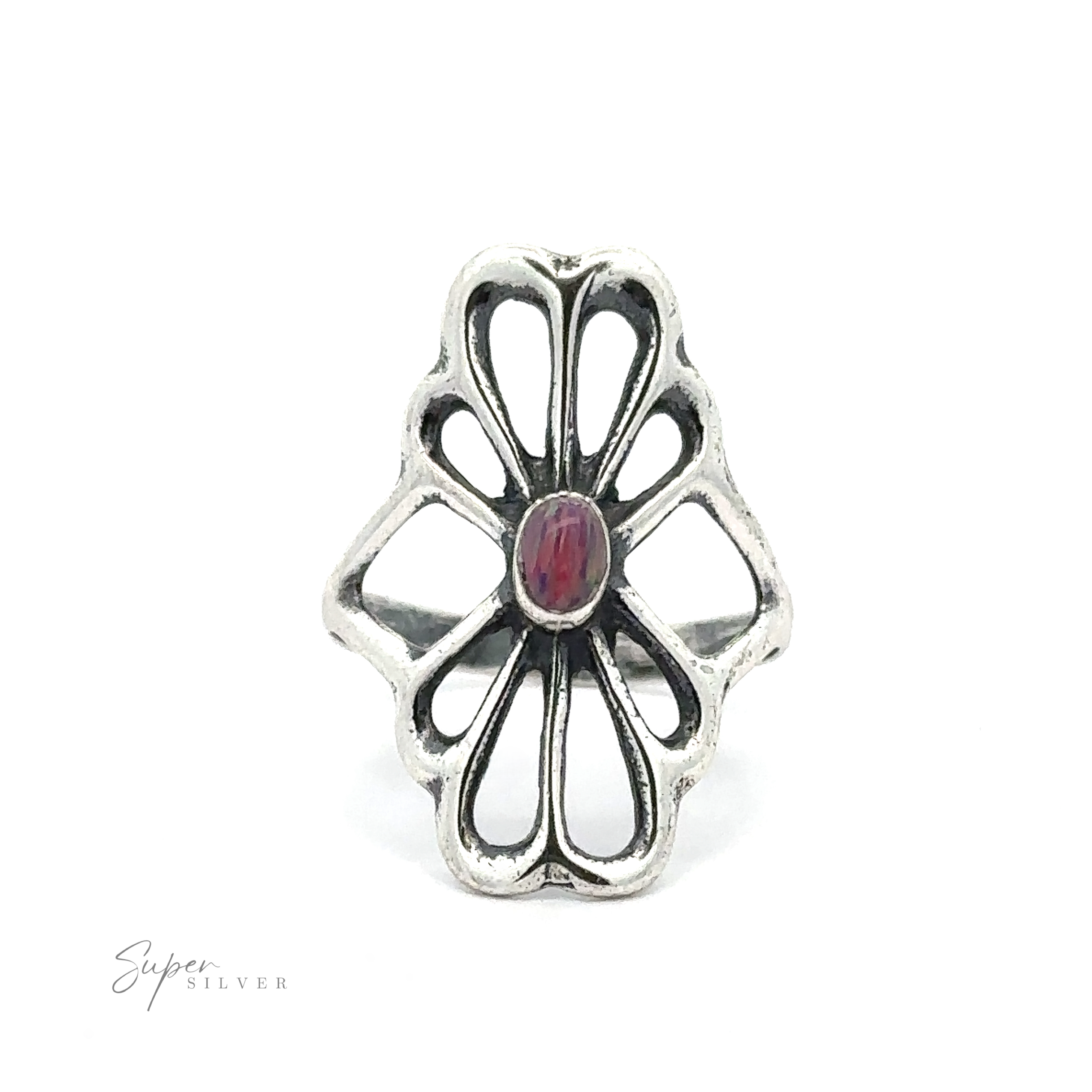 Silver ring with a sterling silver flower design featuring a small red stone in the center. The text "American Made Flower Ring" is visible in the bottom-left corner. This finely crafted piece, reminiscent of a raspberry opal ring, is handcrafted in America.