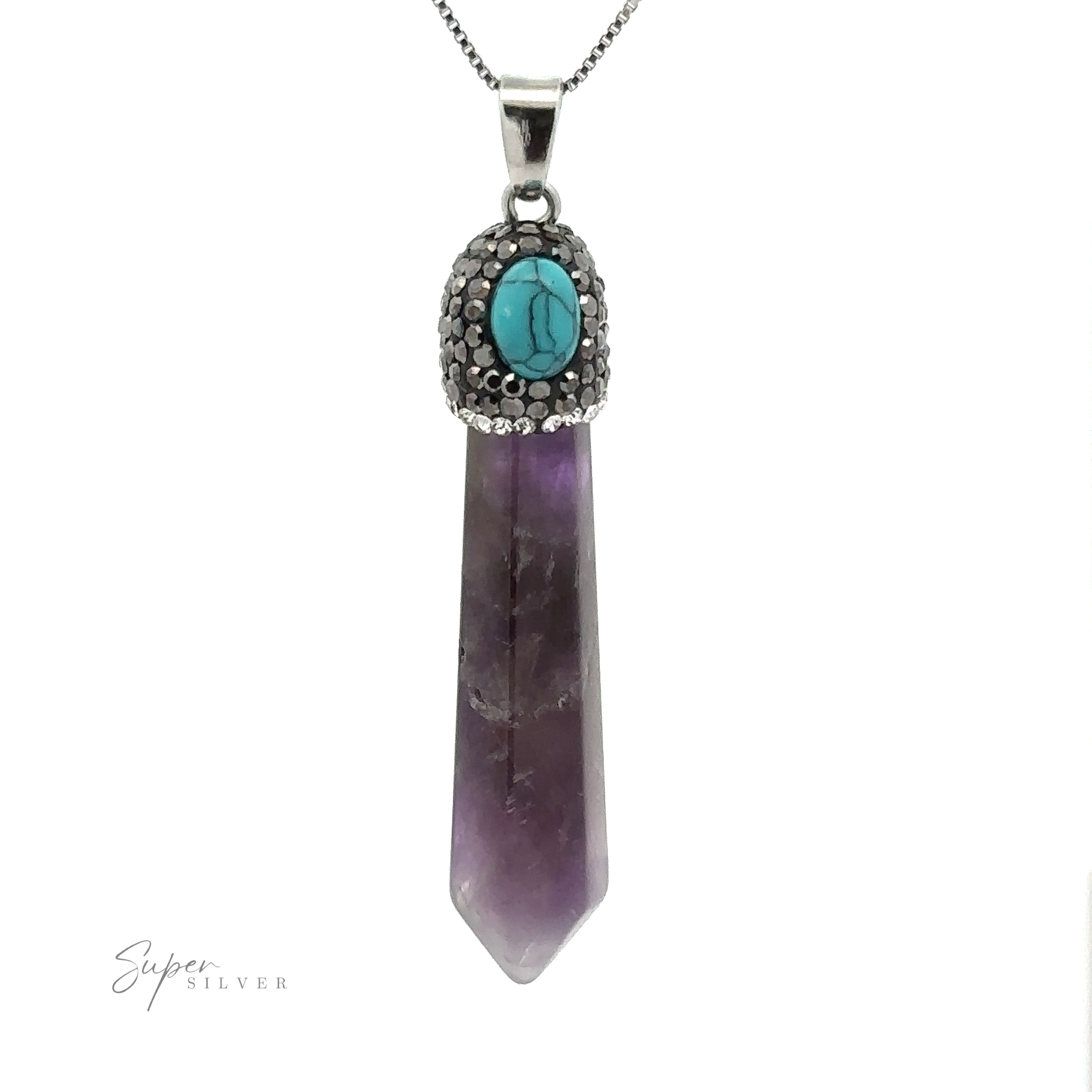 Introducing the Stone Obelisk Pendant: a polished purple stone with a faceted tip, encased in a silver mount adorned with a turquoise stone on top. This exquisite piece hangs gracefully from a silver chain accented with hematite beads for added elegance.