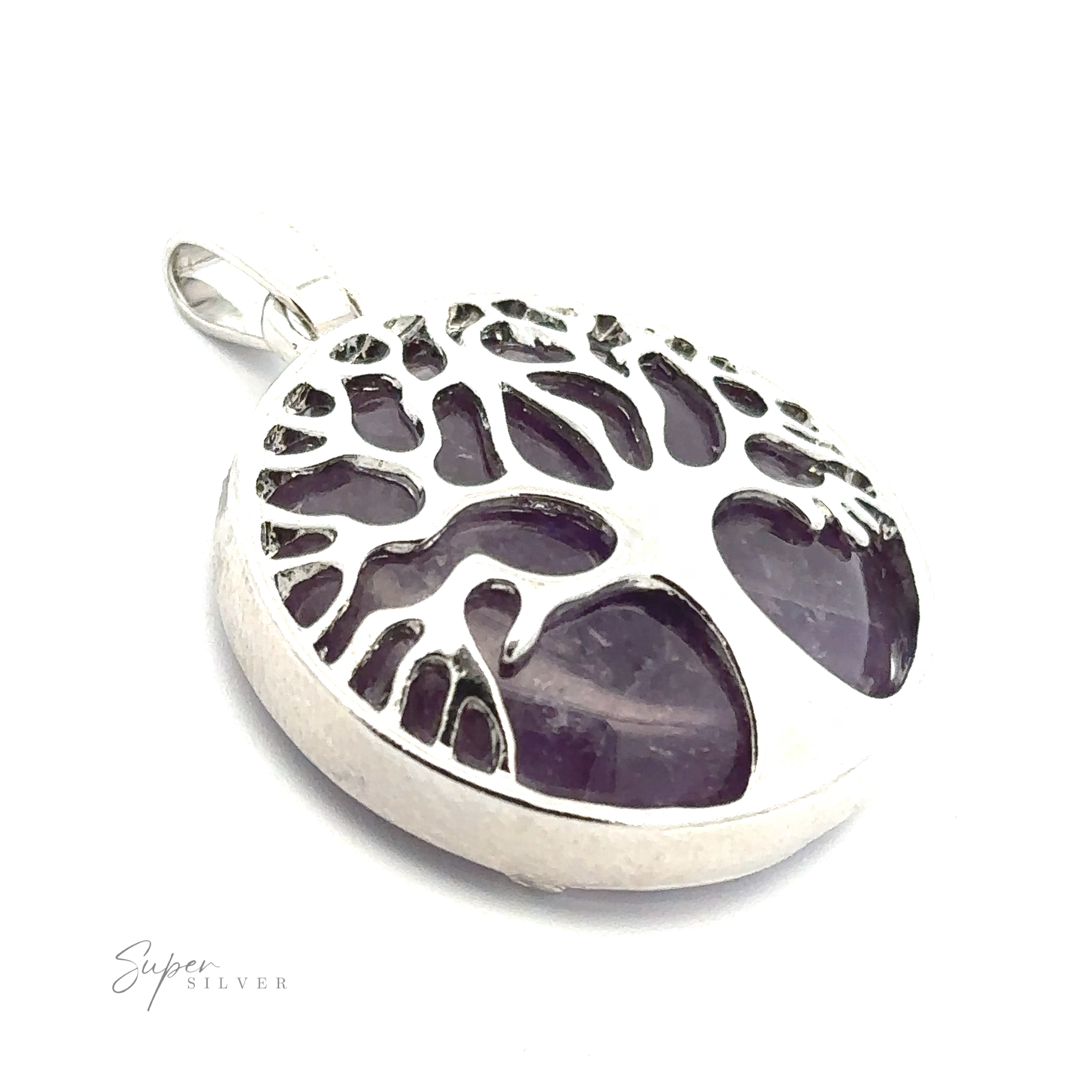 A Tree of Life Pendant featuring a Tree of Life design with purple gemstone insets. The text "Super Silver" is visible at the bottom left.