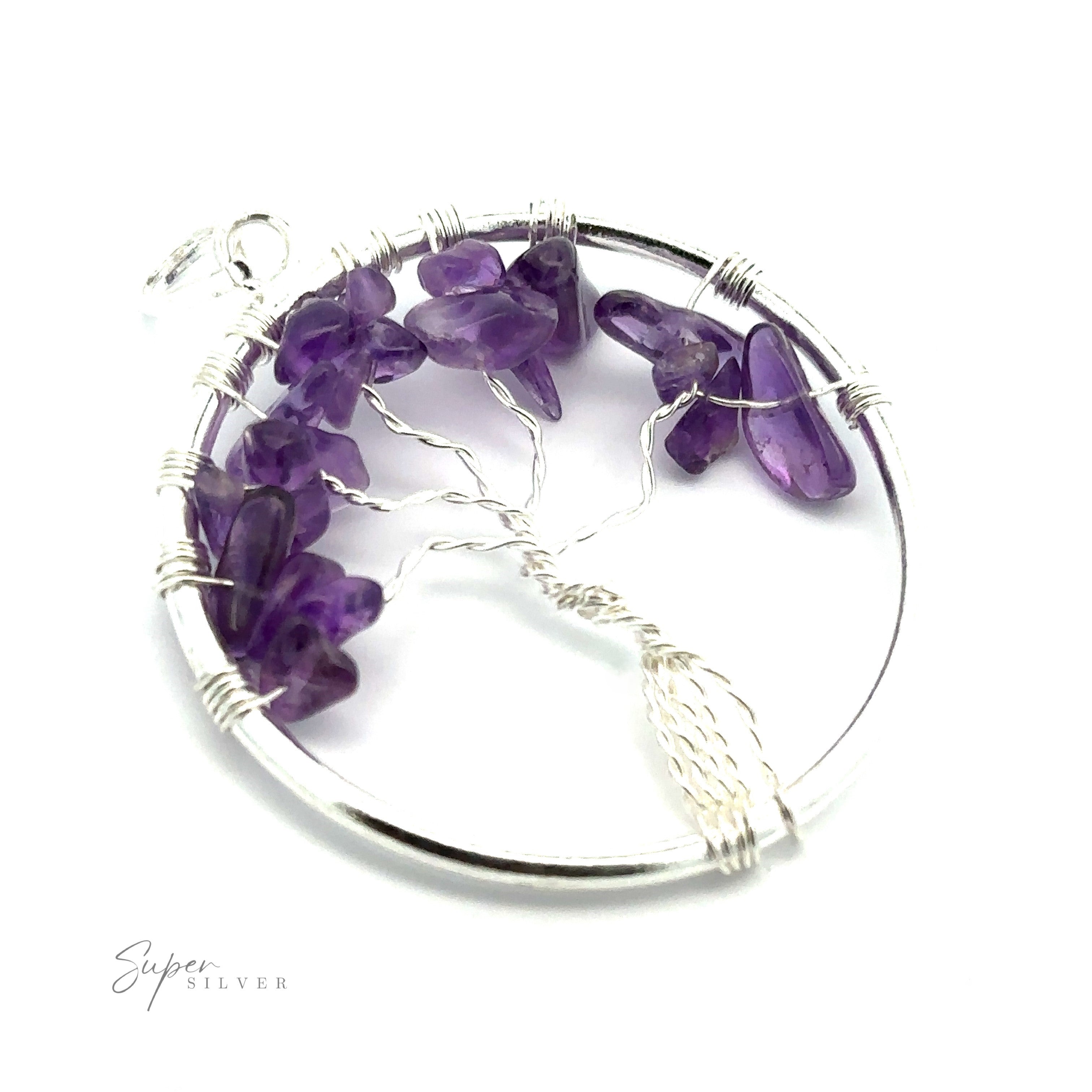 A Wire Wrapped Tree of Life Pendant with Stones, arranged in a circular frame. The inscription "Super Silver" is visible in the bottom left corner.