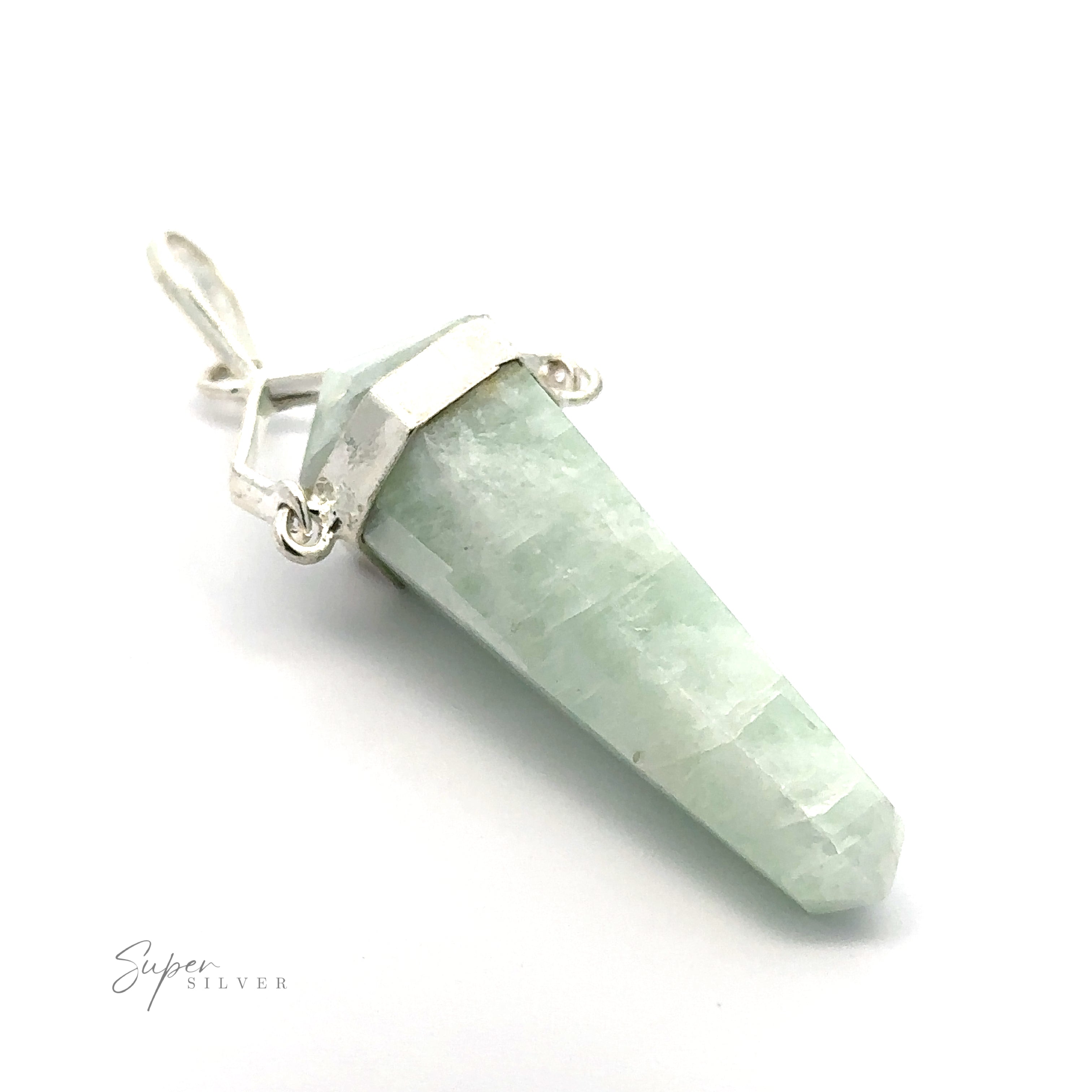 A clear, pointed crystal pendant set in a silver-plated setting, with a loop for attaching to a chain. The light green crystal resembles the Raw Stone Swivel Pendant and boasts the subtle elegance characteristic of fine gemstones.