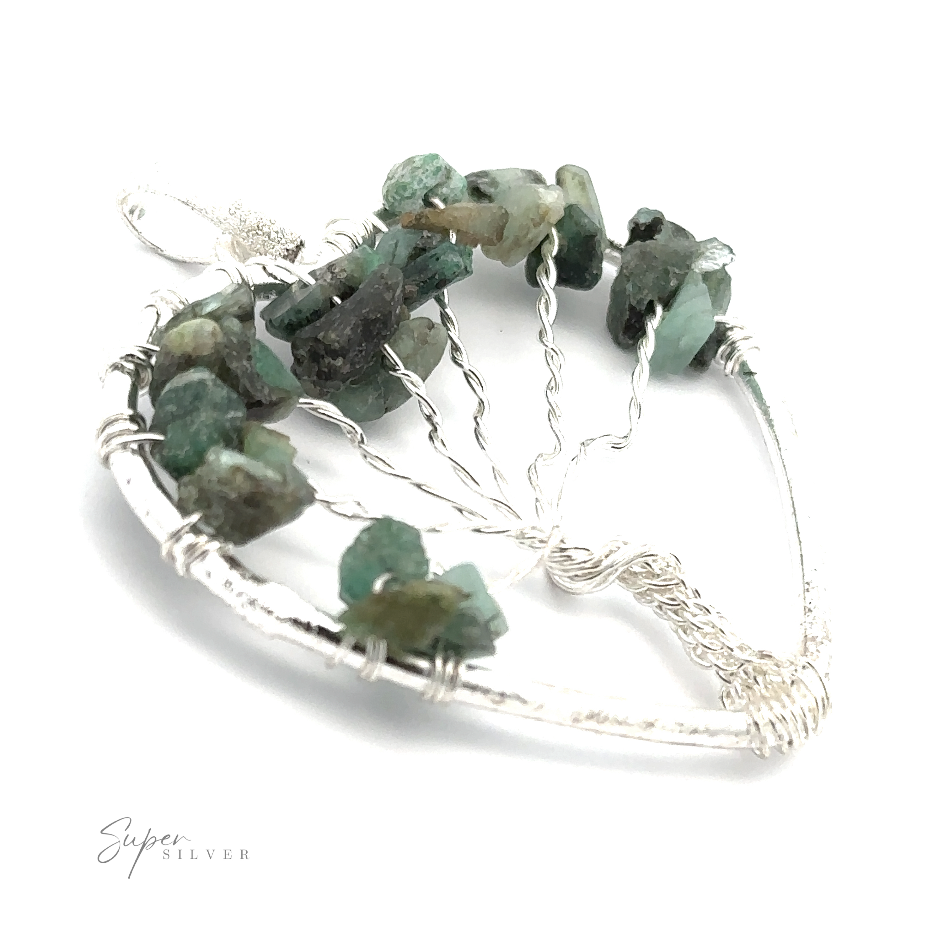 A Heart Shaped Tree of Life Pendant, adorned with green and black crystal chips, against a white background. The text "Super Silver" is visible in the bottom left corner.
