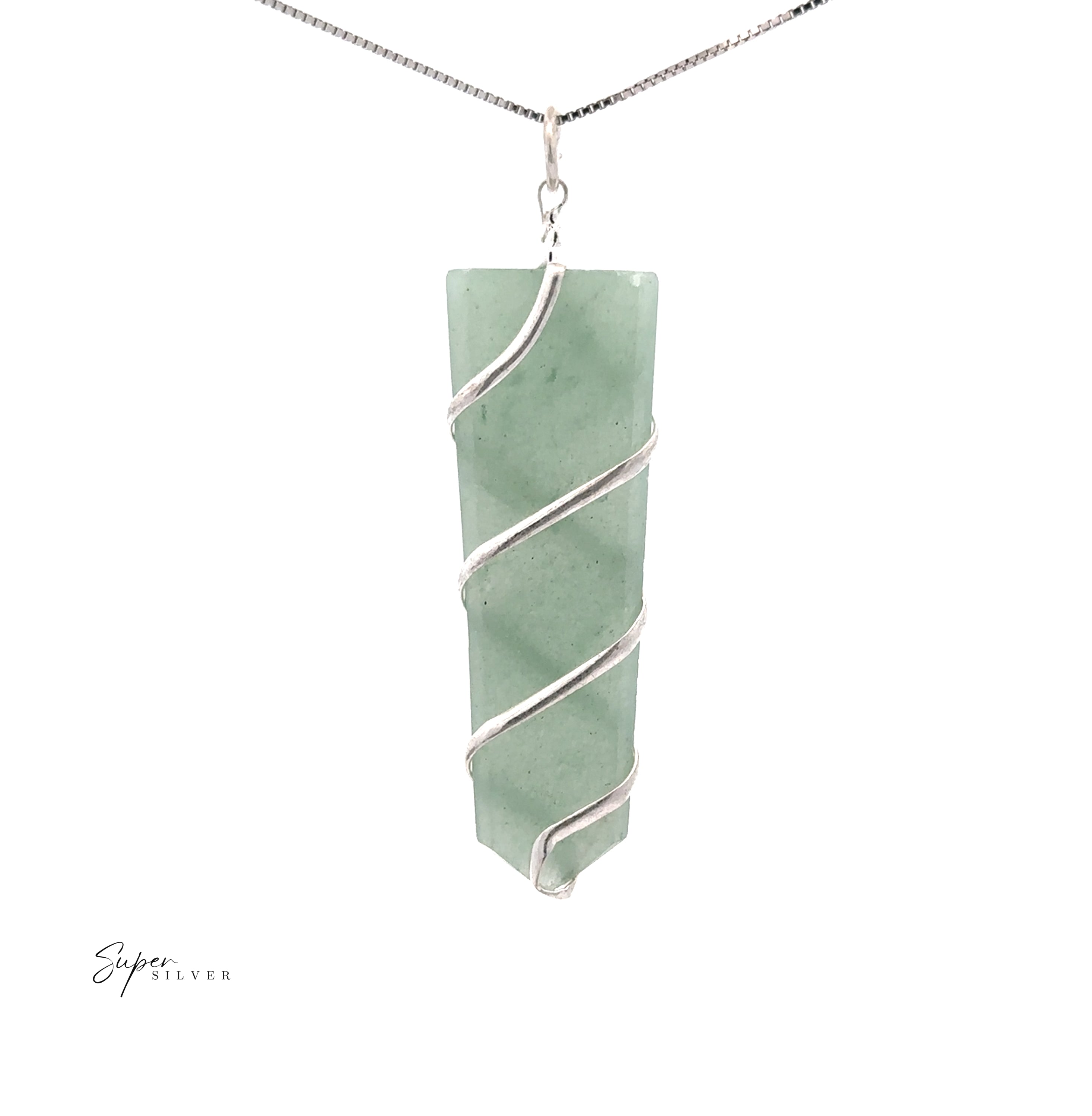 The Wire Wrapped Slab Pendant features a green rectangular gemstone elegantly wrapped in silver wire and suspended from a sleek silver chain, shown on a white background.