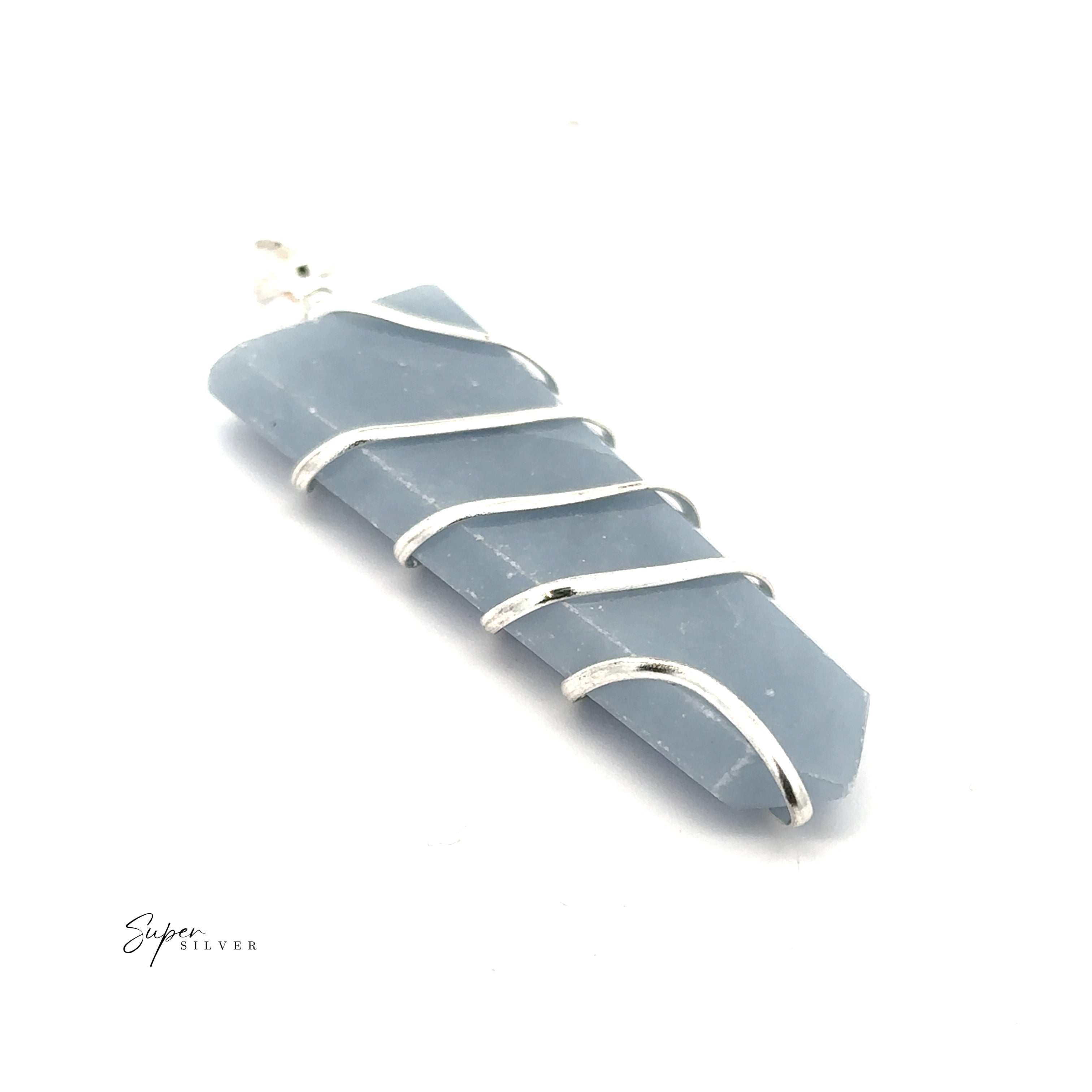 The Wire Wrapped Slab Pendant features a blue gemstone wrapped with a silver spiral for a bold mixed metals look. Shown on a white background.