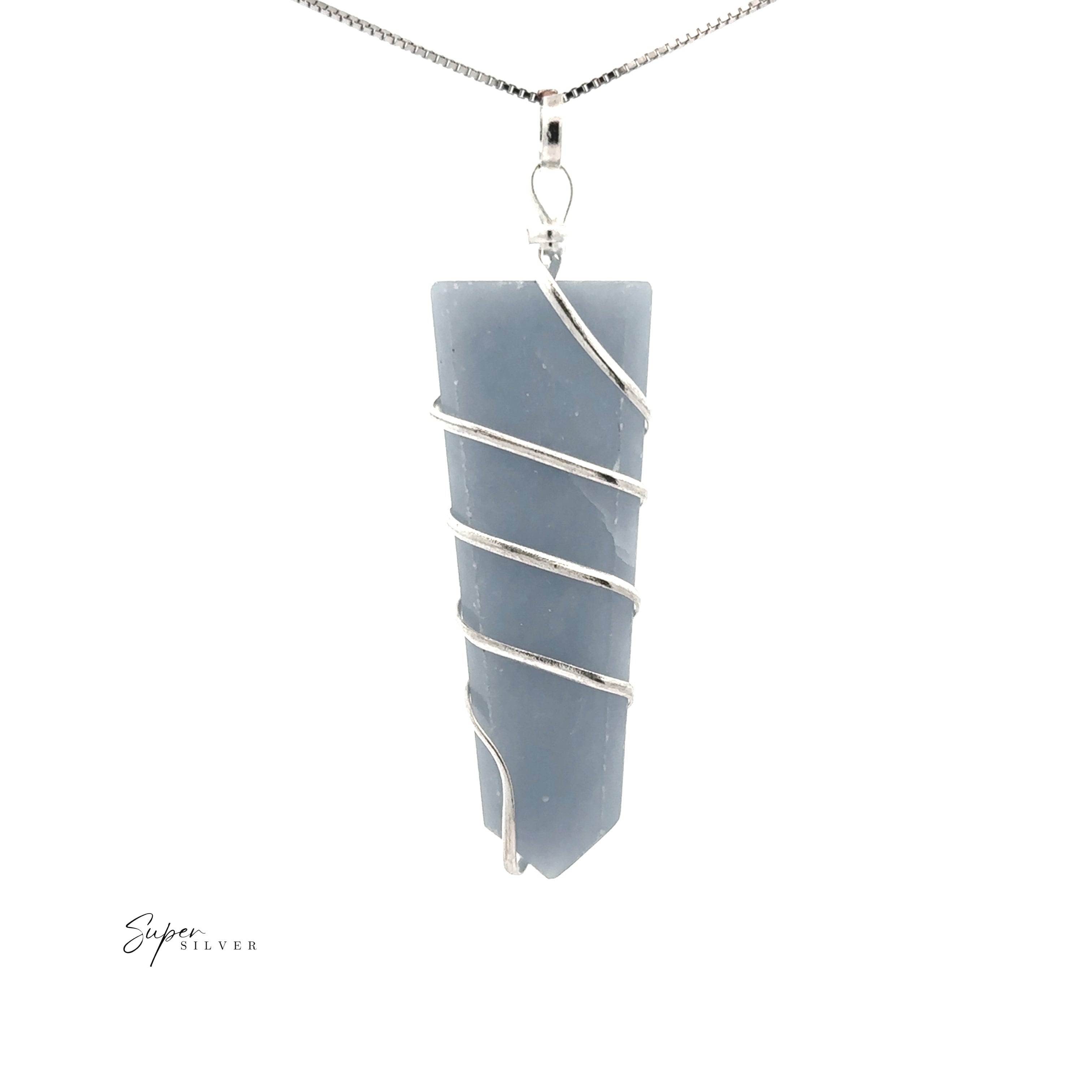 The Wire Wrapped Slab Pendant is a silver chain necklace with a blue gemstone secured in silver wire, shown on a white background.