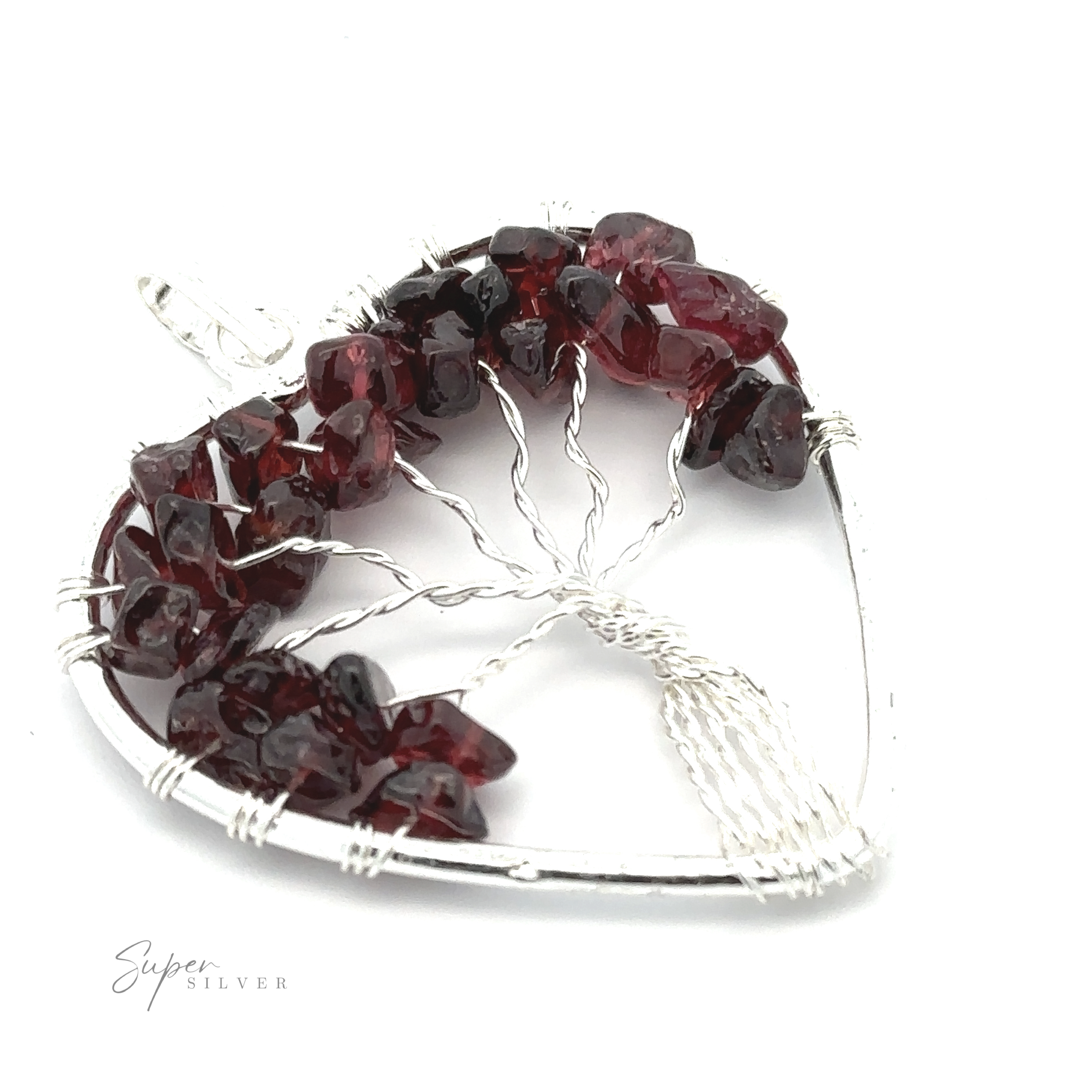 A Heart Shaped Tree of Life Pendant featuring a wire-wrapped tree design adorned with dark red gemstone chips. The text "Super Silver" is at the bottom left.