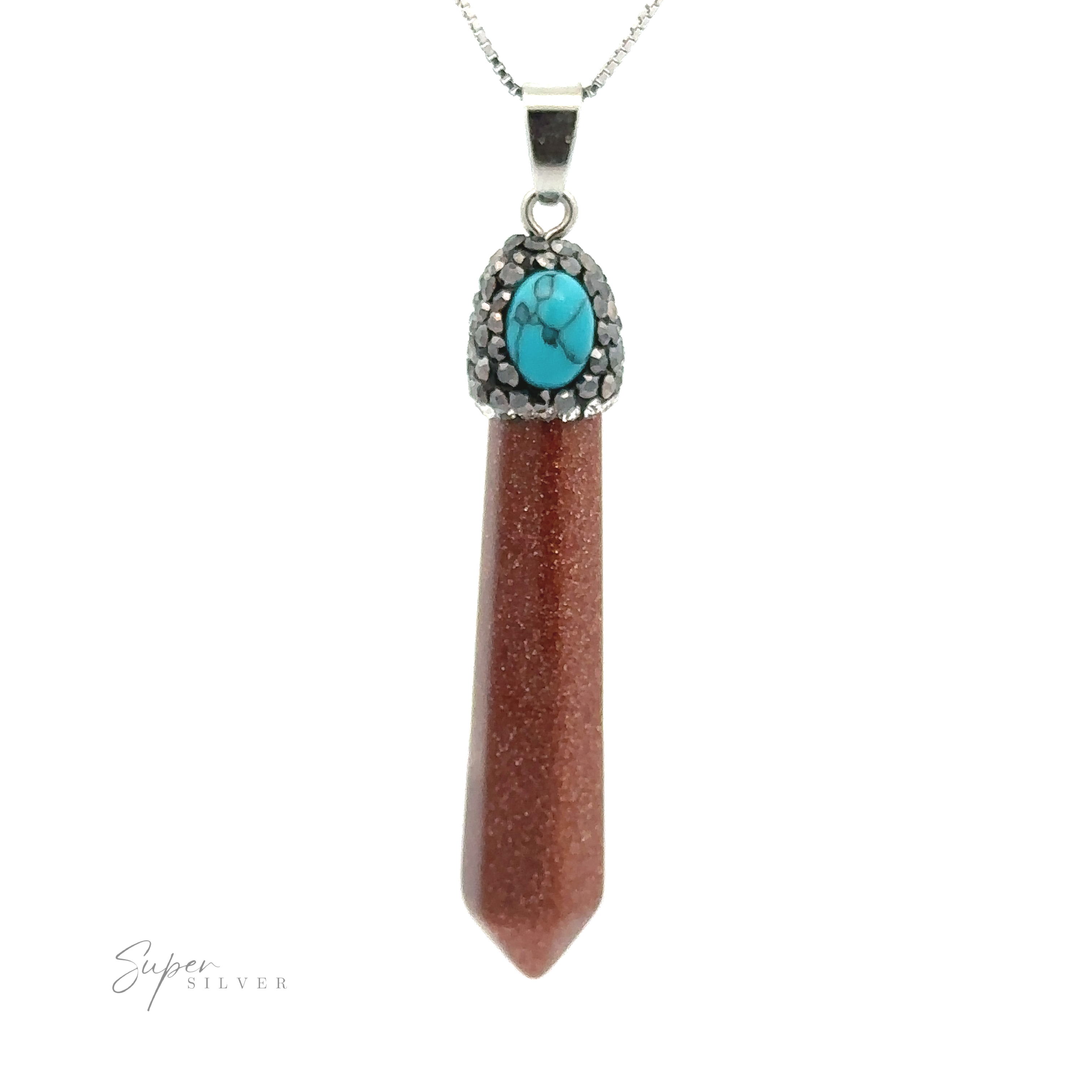 A Stone Obelisk Pendant featuring an obelisk crystal pendant with a polished brown crystal and a decorative silver cap adorned with a small turquoise stone. The chain is a simple silver link design, accented by delicate hematite beads.