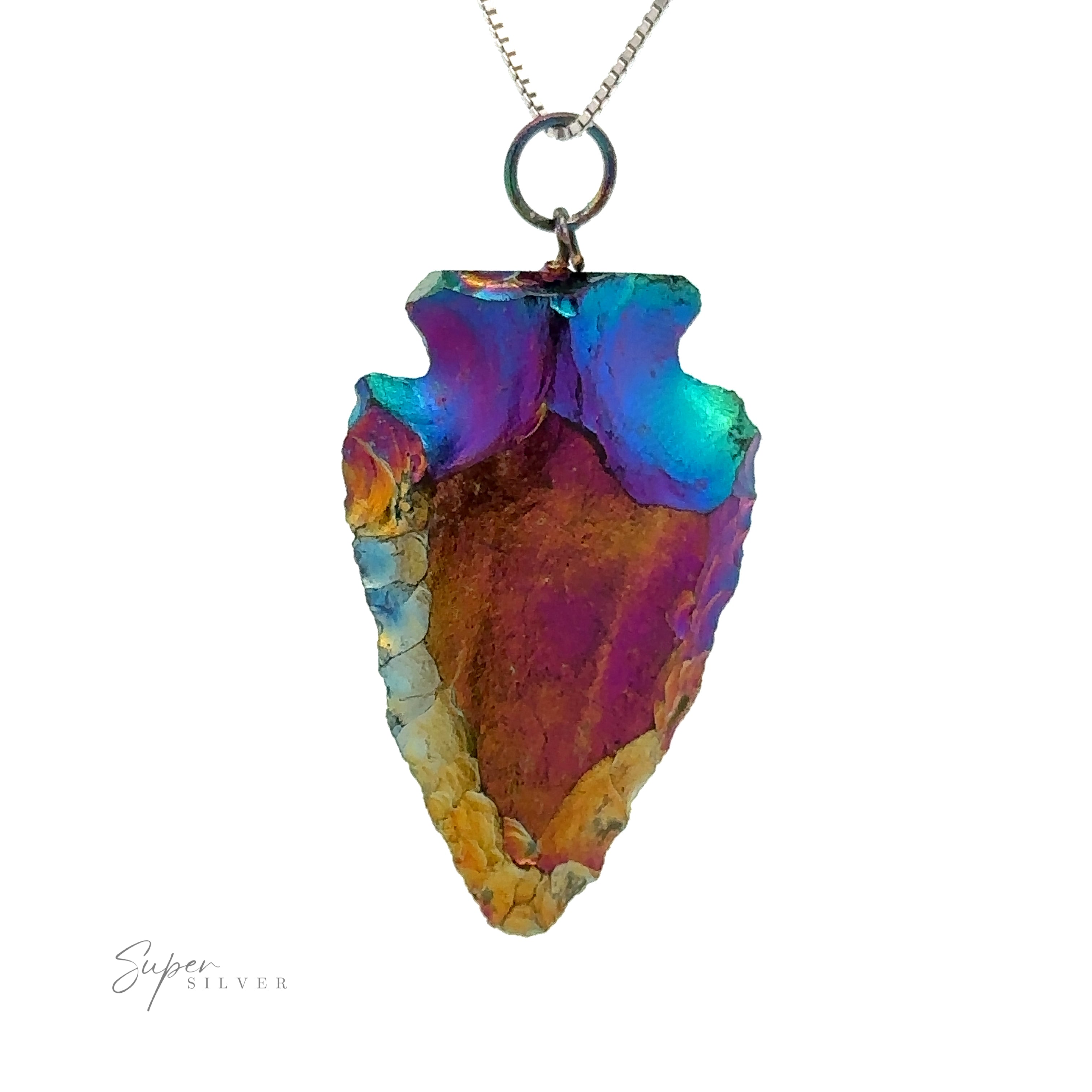 A colorful, iridescent Rainbow Hematite Arrowhead Pendant with a small metal loop and chain is featured on a white background. The mixed metals in the pendant display vivid hues of purple, blue, and gold.