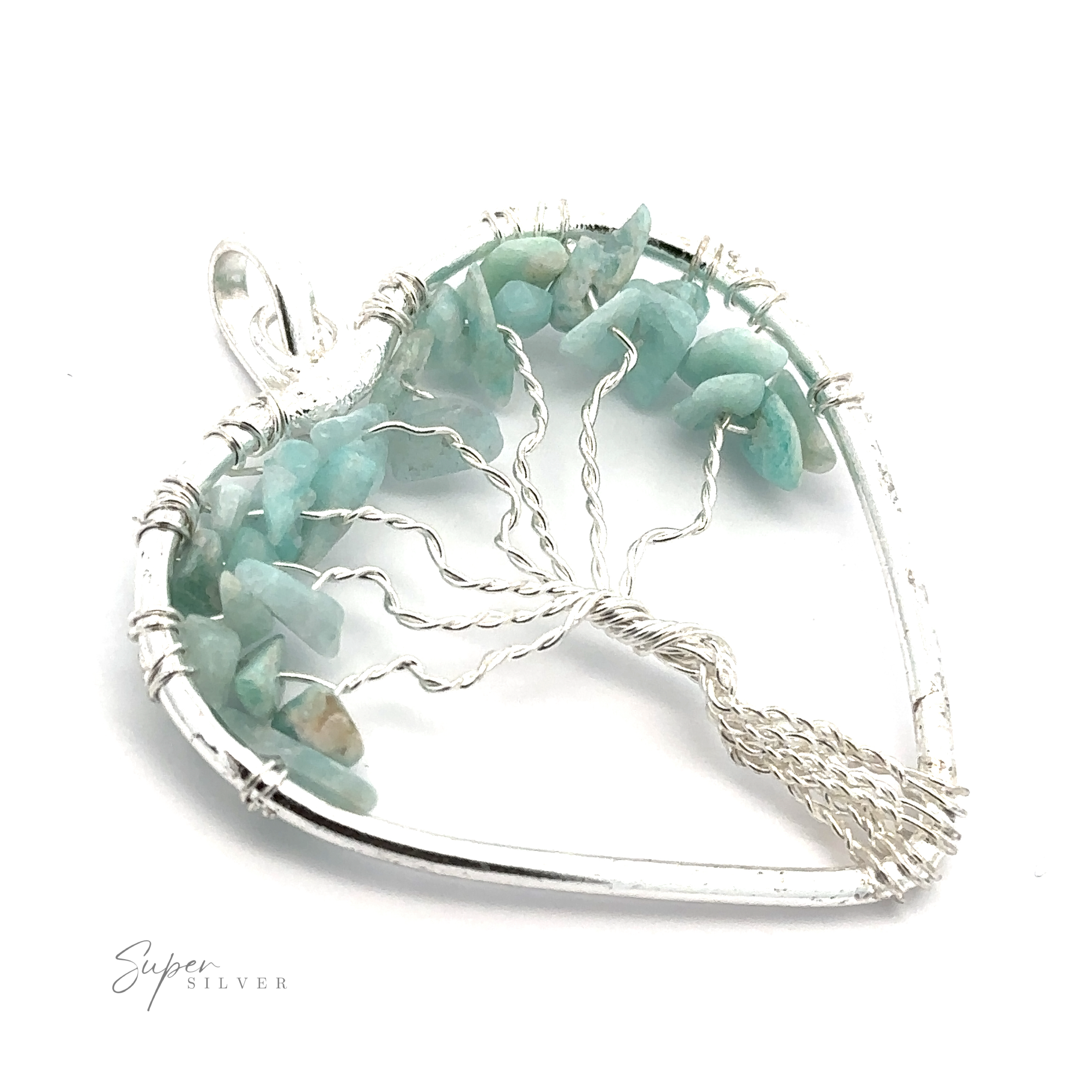 A Heart Shaped Tree of Life Pendant with turquoise stones arranged to resemble a wire wrapped tree of life inside the heart frame.