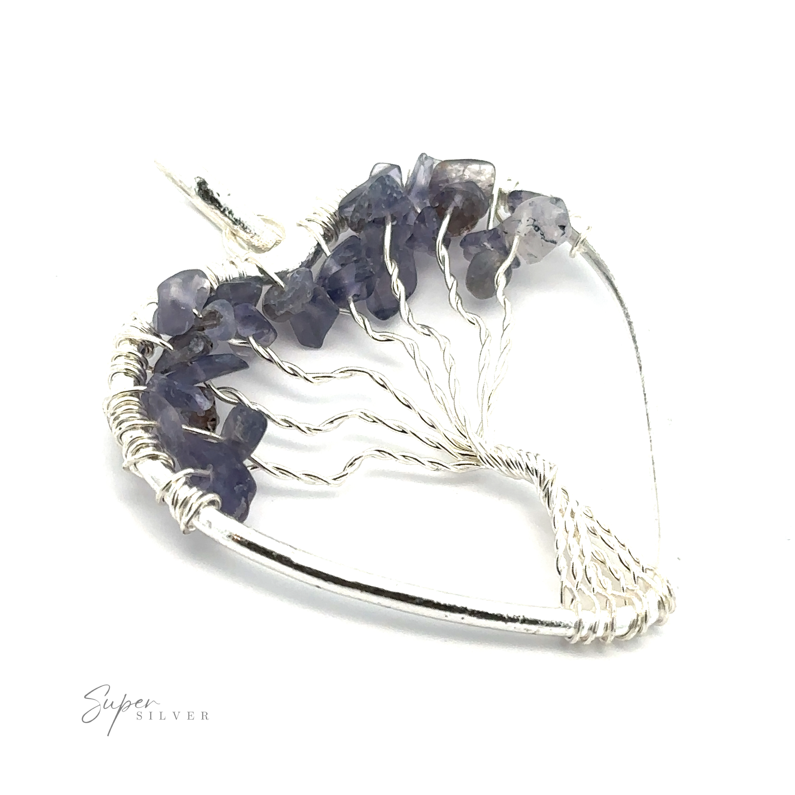 A Heart Shaped Tree of Life Pendant. The design has a delicate, intricate appearance.