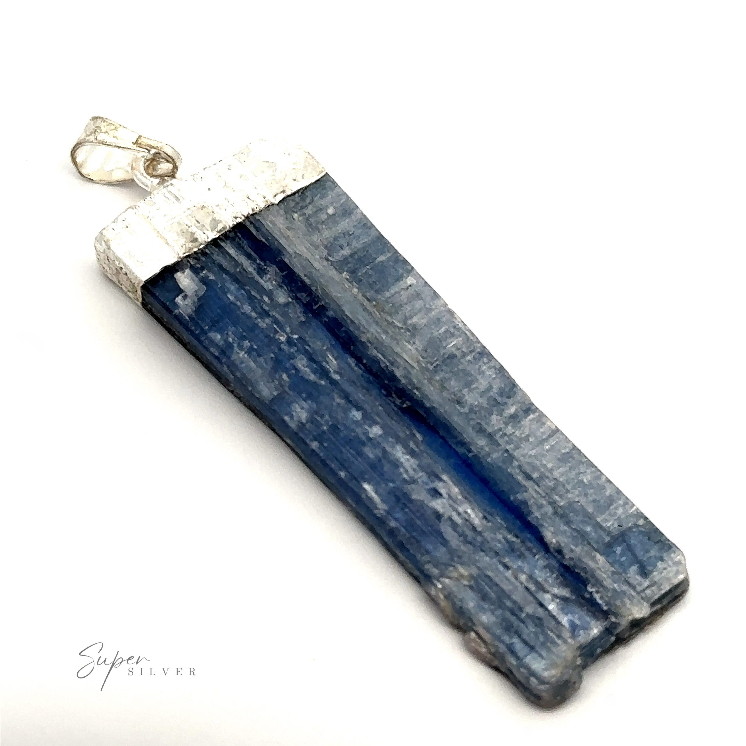 A Raw Crystal Pendant With Silver Cap featuring a rectangular blue kyanite crystal with a silver top and bail, perfect for attaching to a necklace.