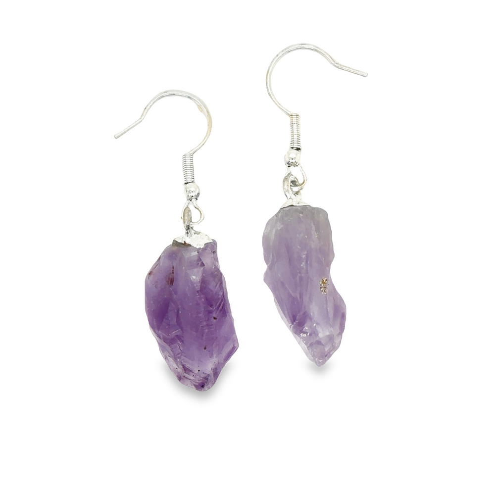 
                  
                    Super Silver's Simple Raw Crystal Earrings are boho-inspired amethyst dangle earrings featuring raw crystals.
                  
                