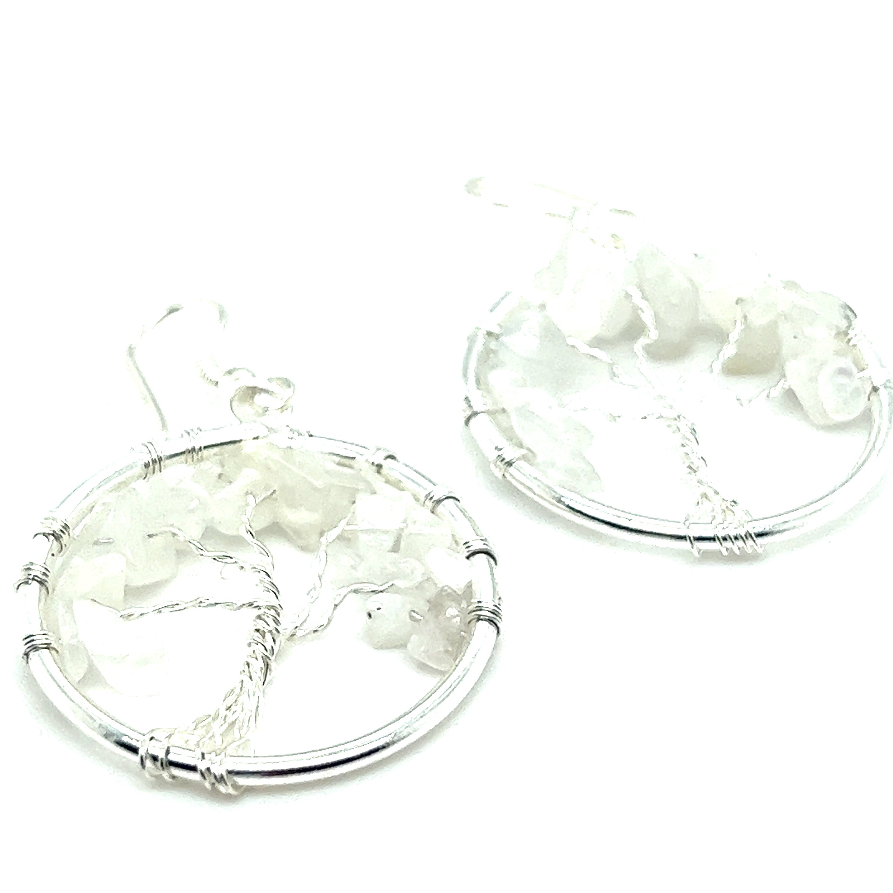 A pair of Gemstone Tree Earrings with white flowers and wire wrapped Tree of Life design by Super Silver.