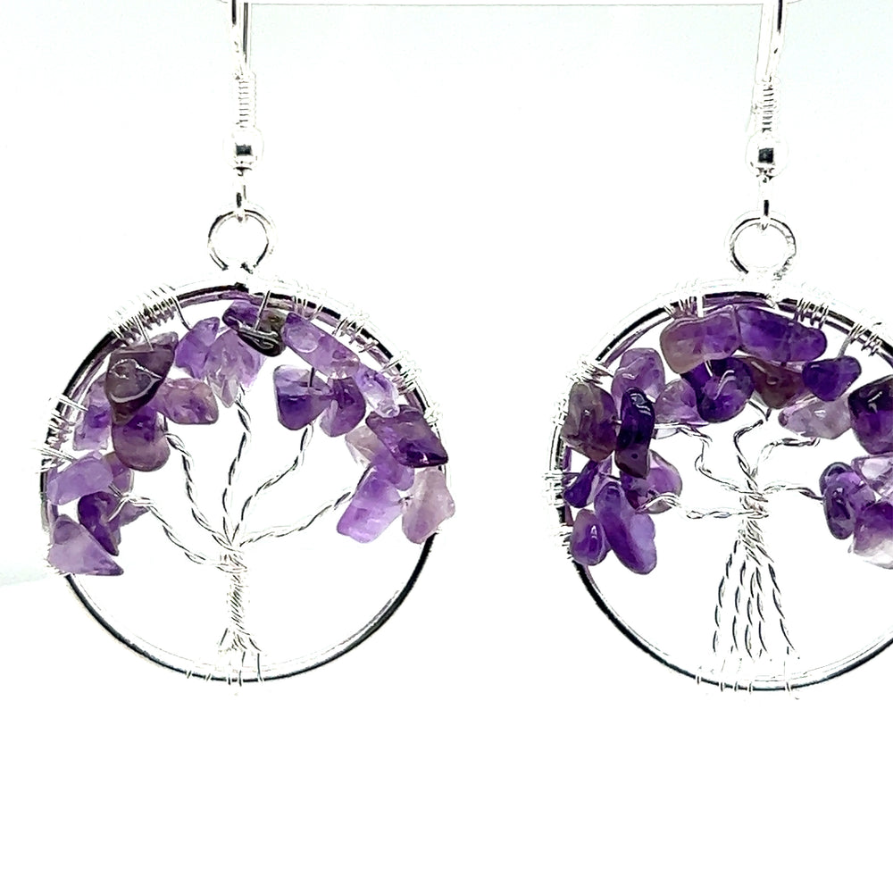
                  
                    Beautiful Gemstone Tree Earrings wire wrapped earrings featuring a delicate Super Silver Tree of Life design.
                  
                