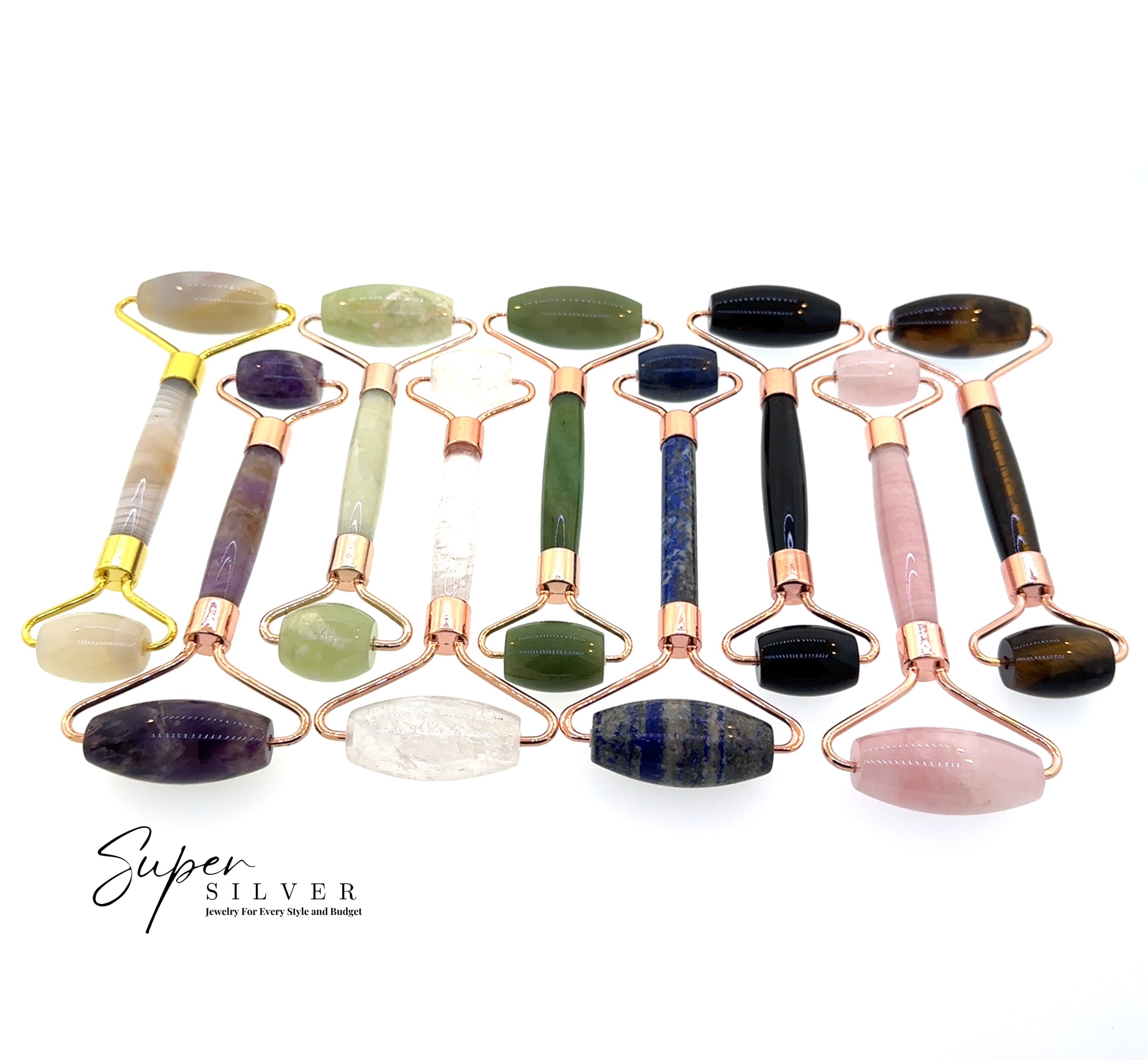 Stone Face-Rollers with metal handles are displayed in two rows on a white background, ideal for elevating your skincare routine. "Super Silver" branding features in the bottom left corner.