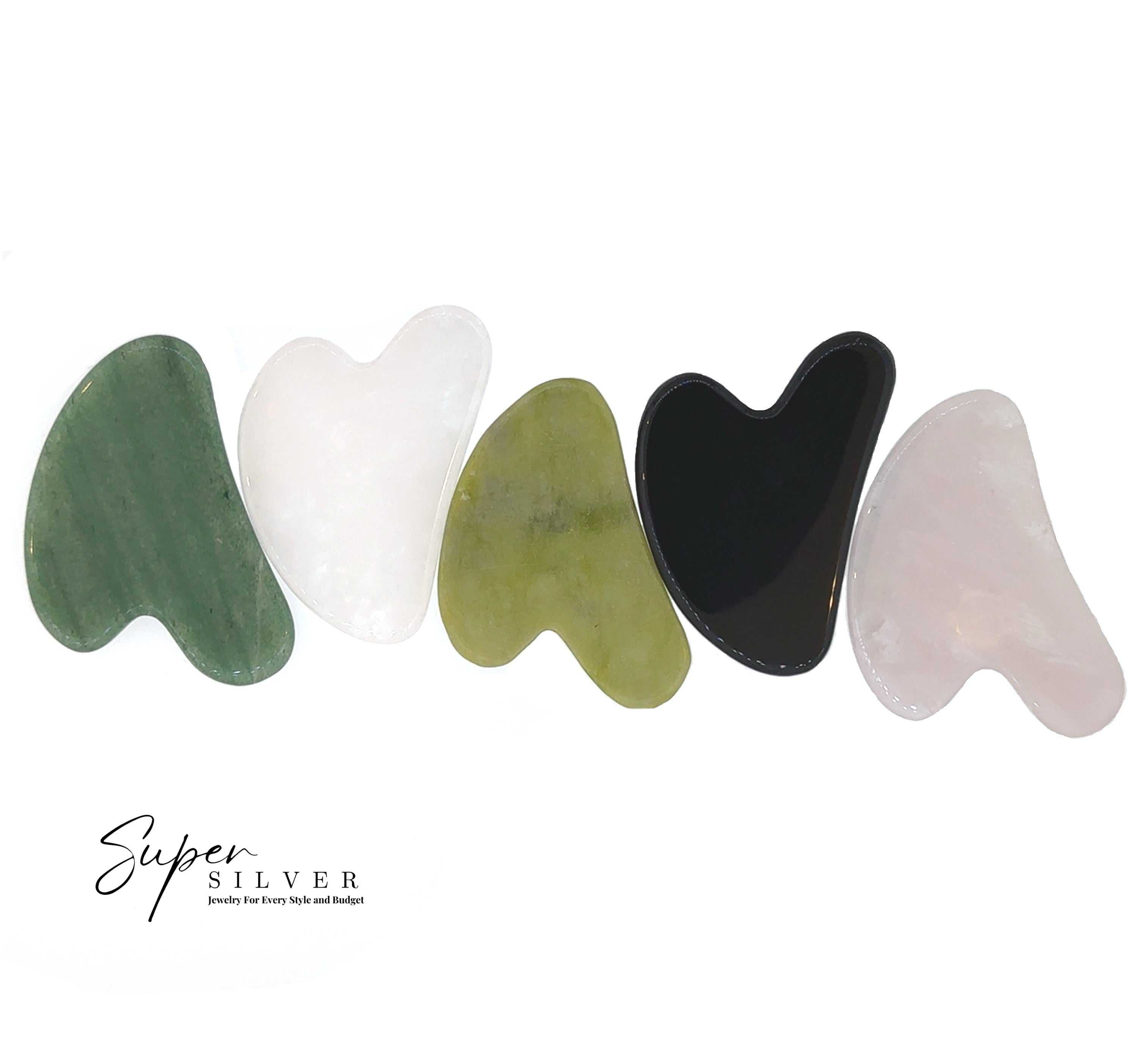 Five Stone Gua Sha tools in green, white, yellow-green, black, and pink genuine gemstones are displayed in a row on a white background. The "Super Silver" logo is seen in the lower left. Ideal for your self-care routine.