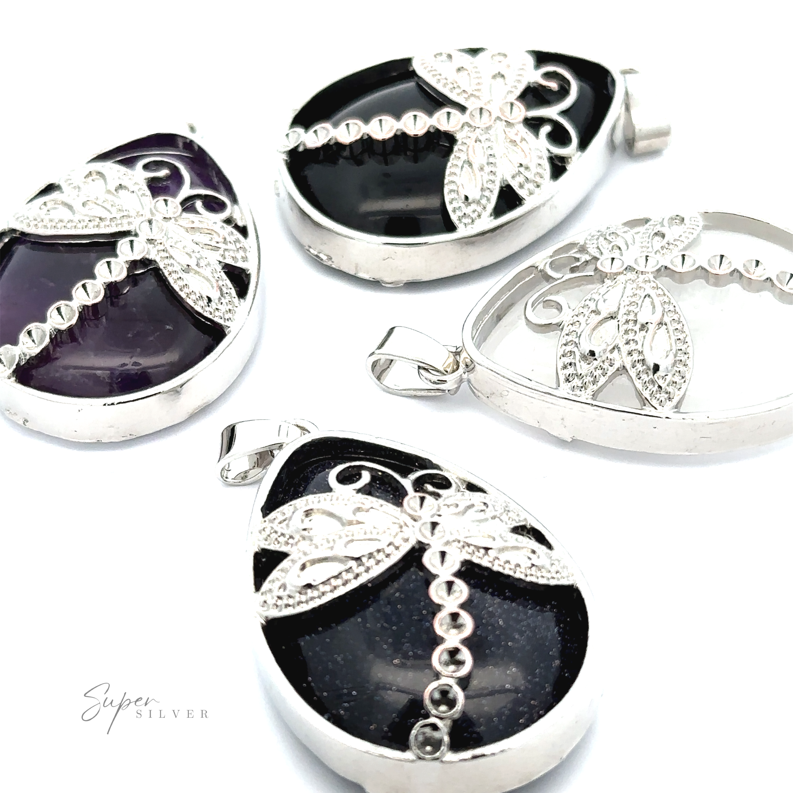 Four Teardrop Stone pendants with Dragonfly, each featuring different shades of dark stones and mixed metals, including a stunning amethyst piece.